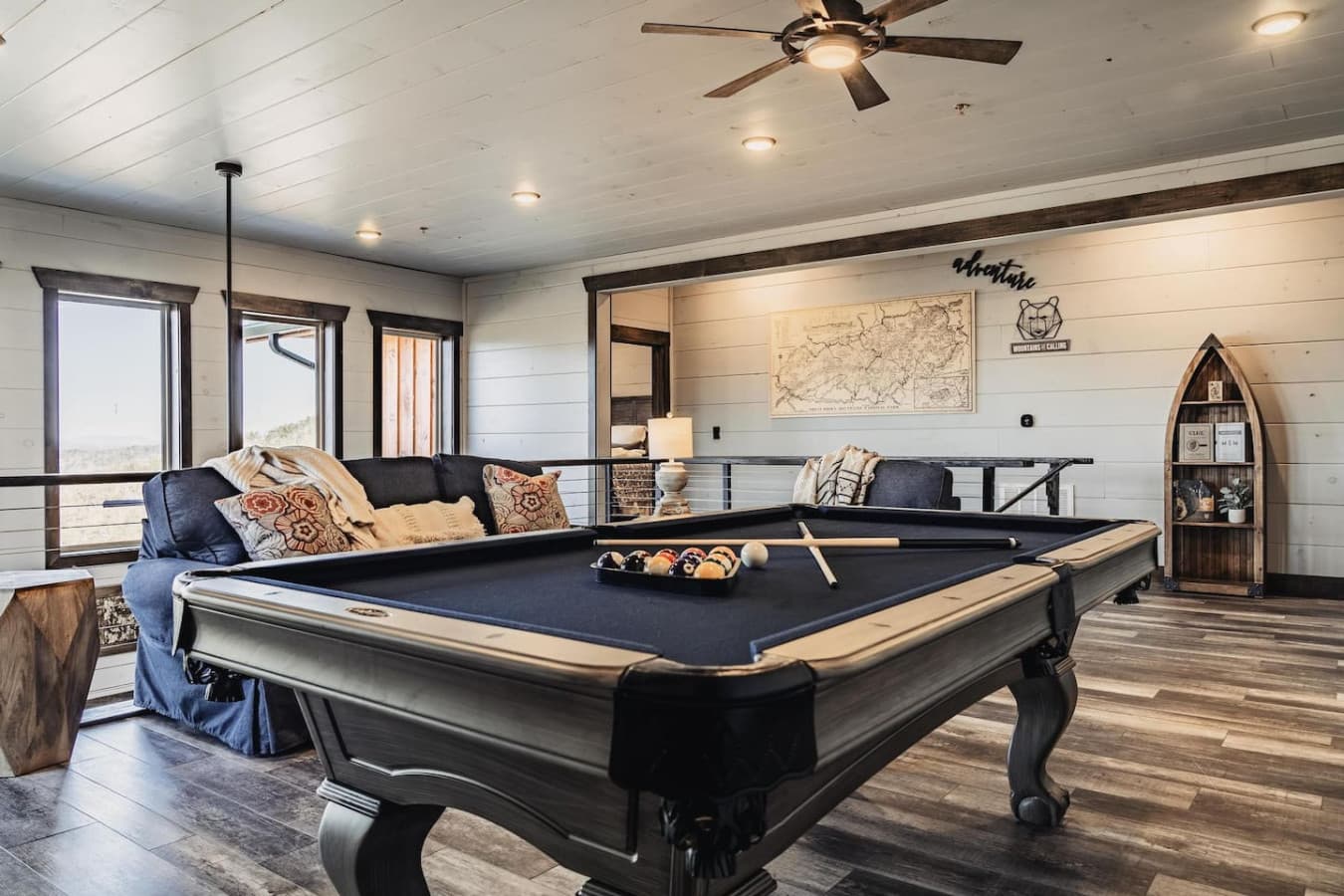 The game room is located upstairs alongside 3 additional bedrooms (King 3, Queen 2 and bunk beds)