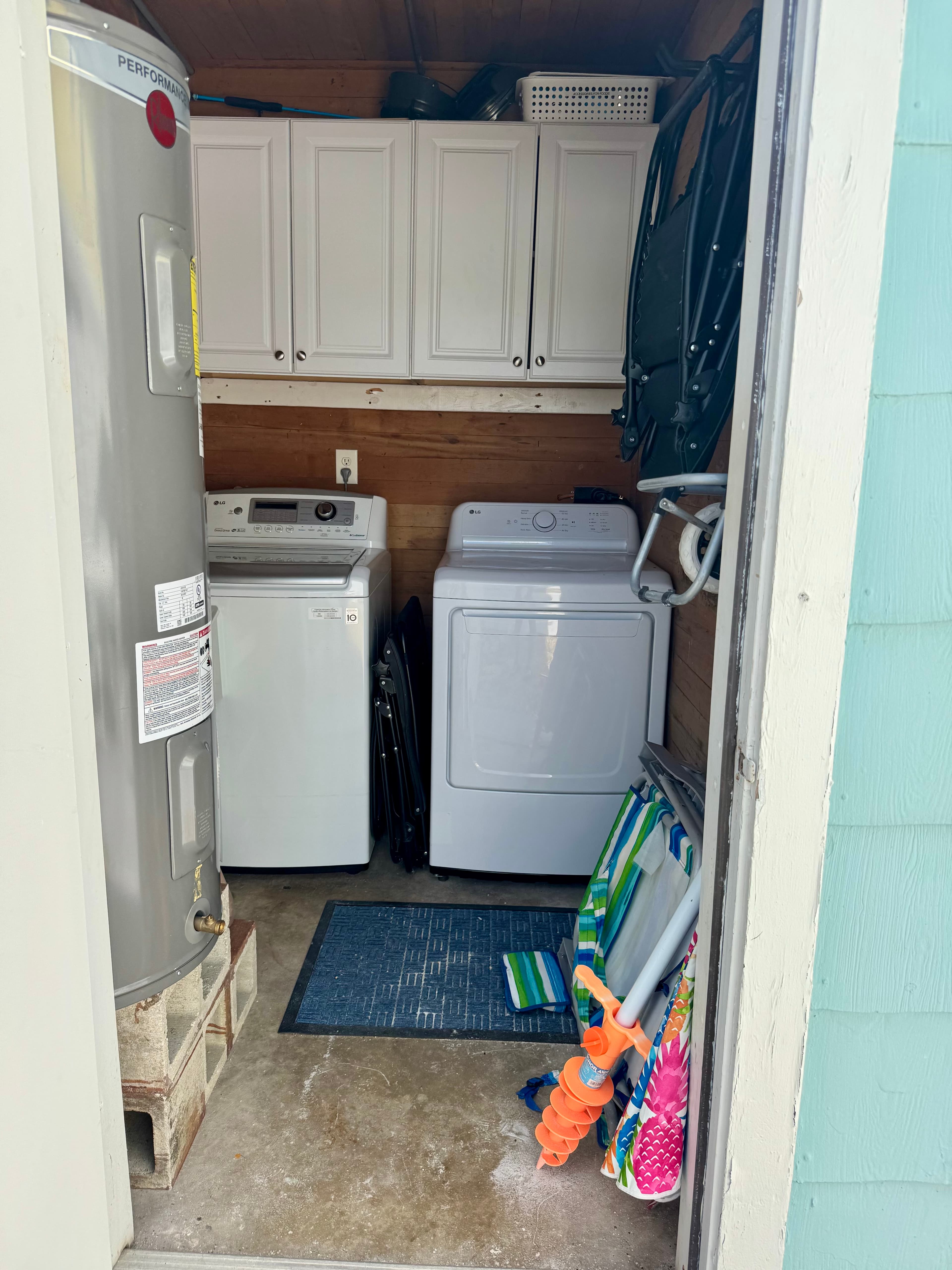 Laundry room at the bottom of the stairs. Not shared