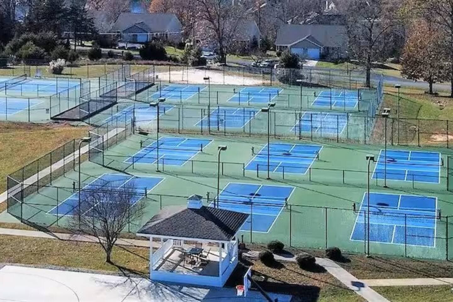 Enjoy unlimited access to a top-notch community sports complex featuring lighted tennis and pickleball courts—perfect for active days and friendly competition during your stay!

