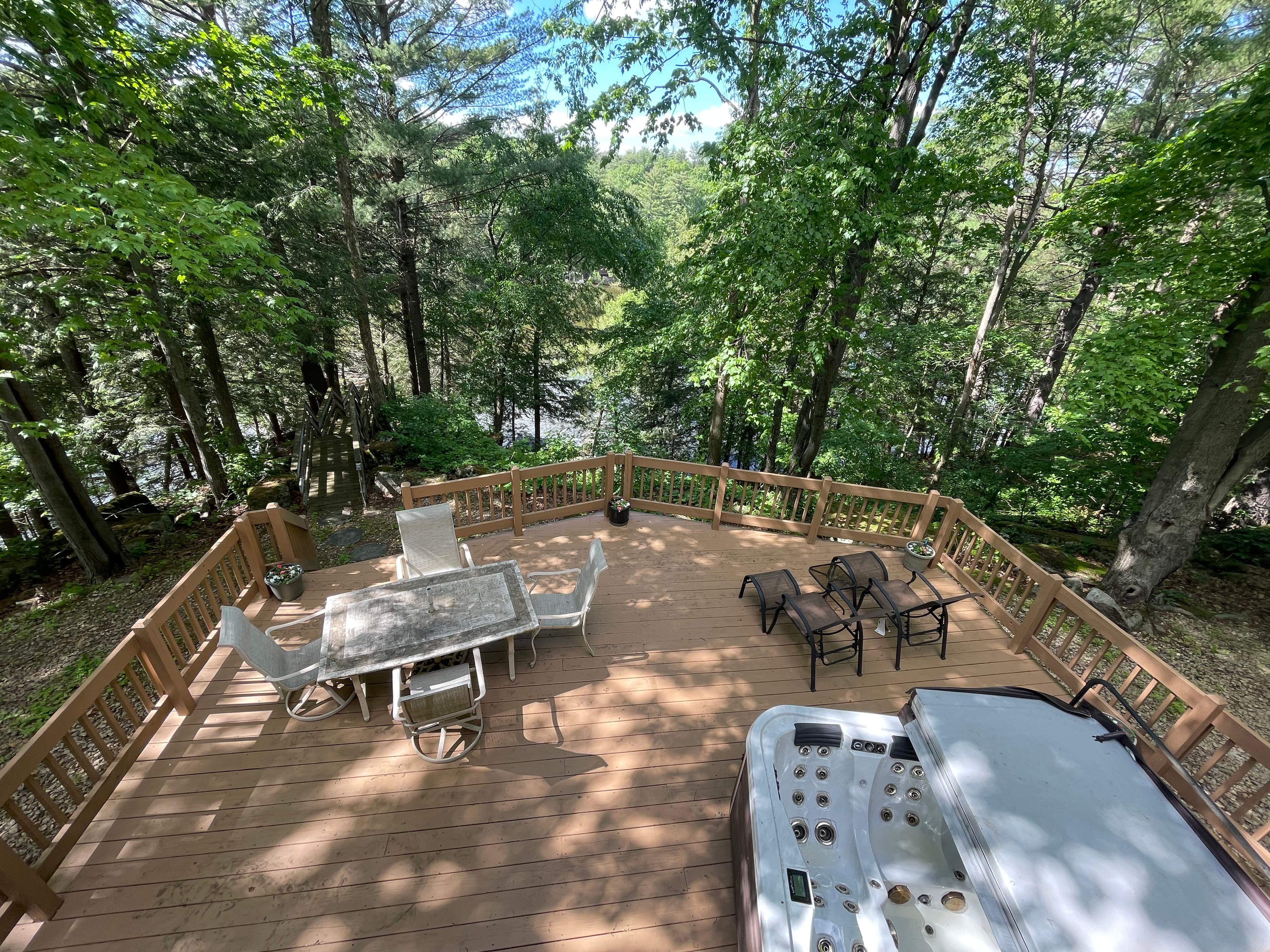 Lower deck with lake views and hot tub