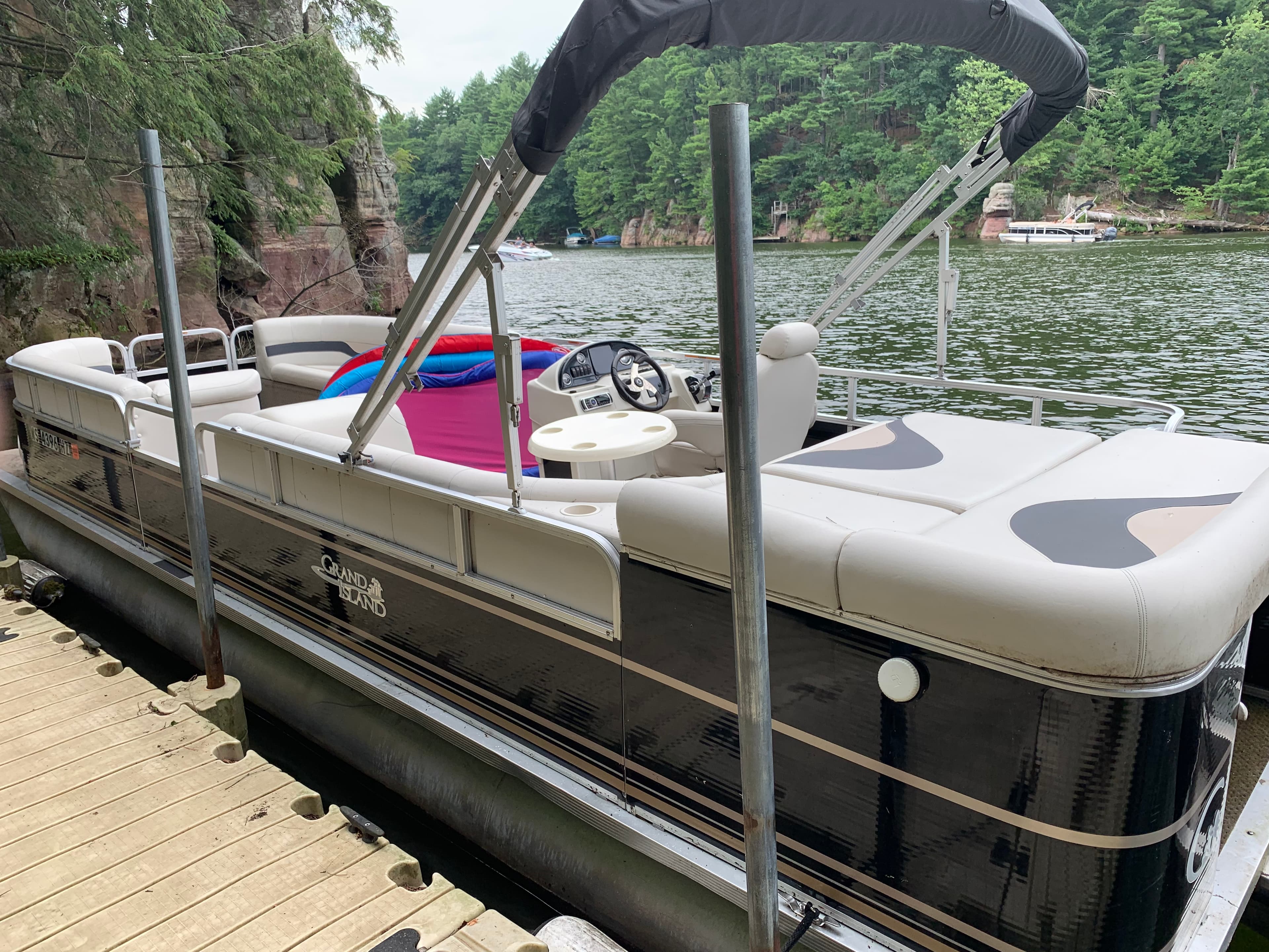 Private dock with available pontoon boat
