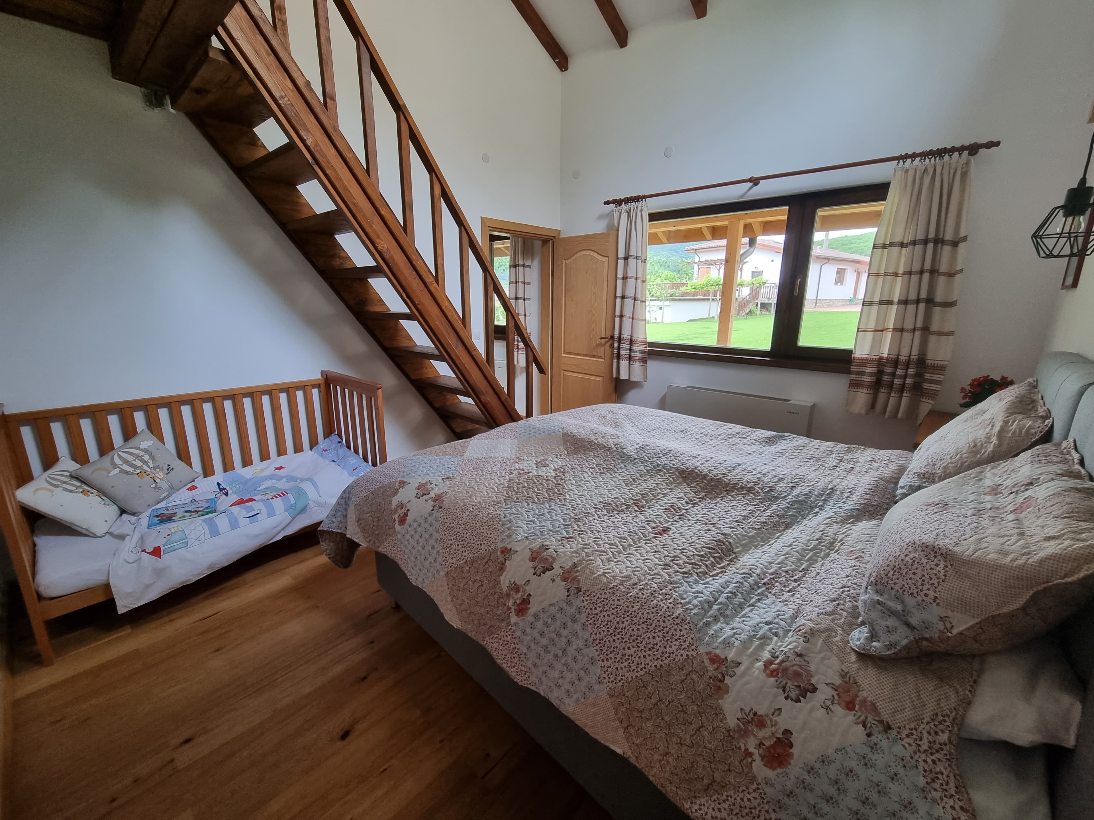 Bedroom 2, with child bed