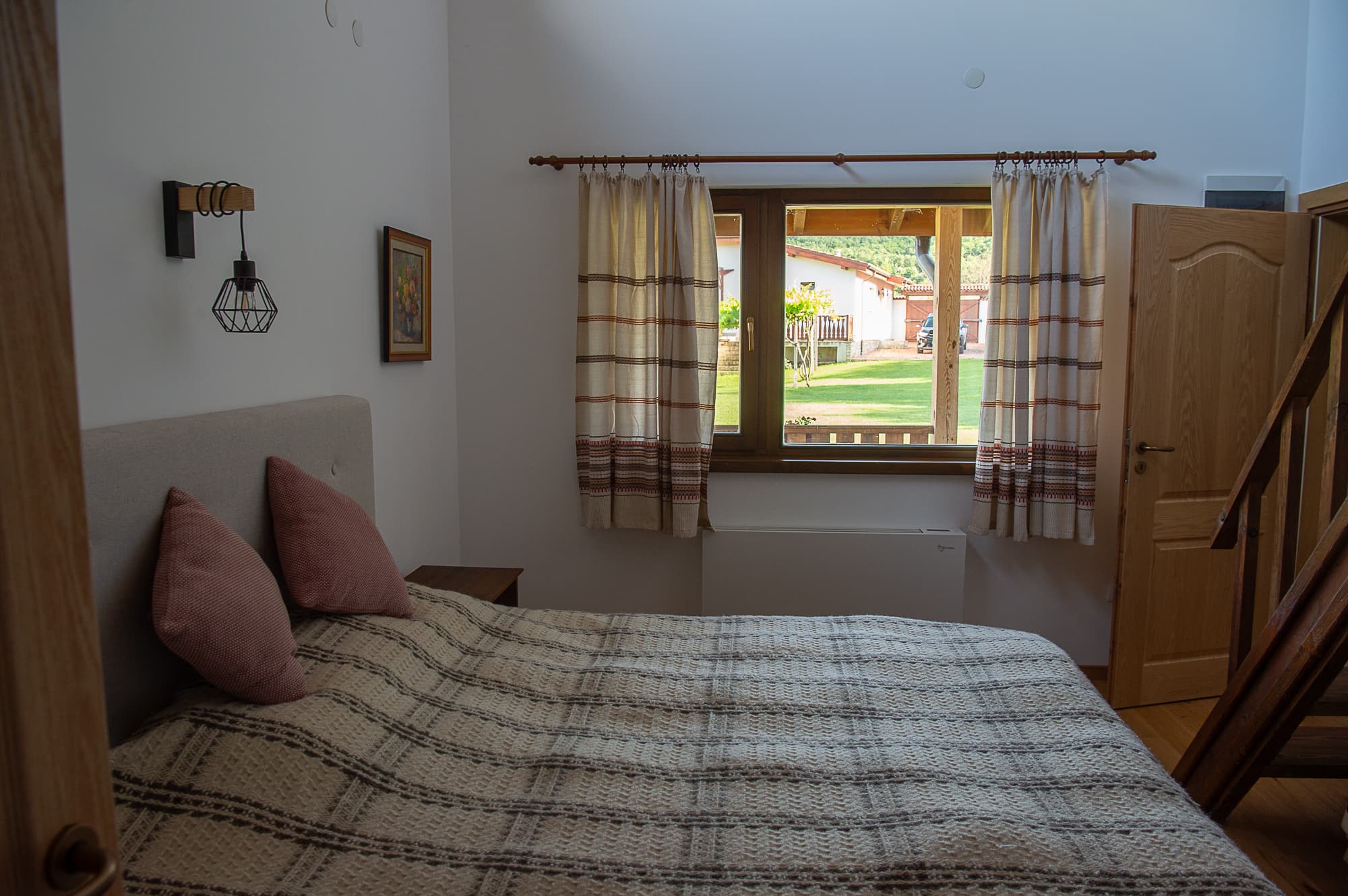 Bedroom with view of garden