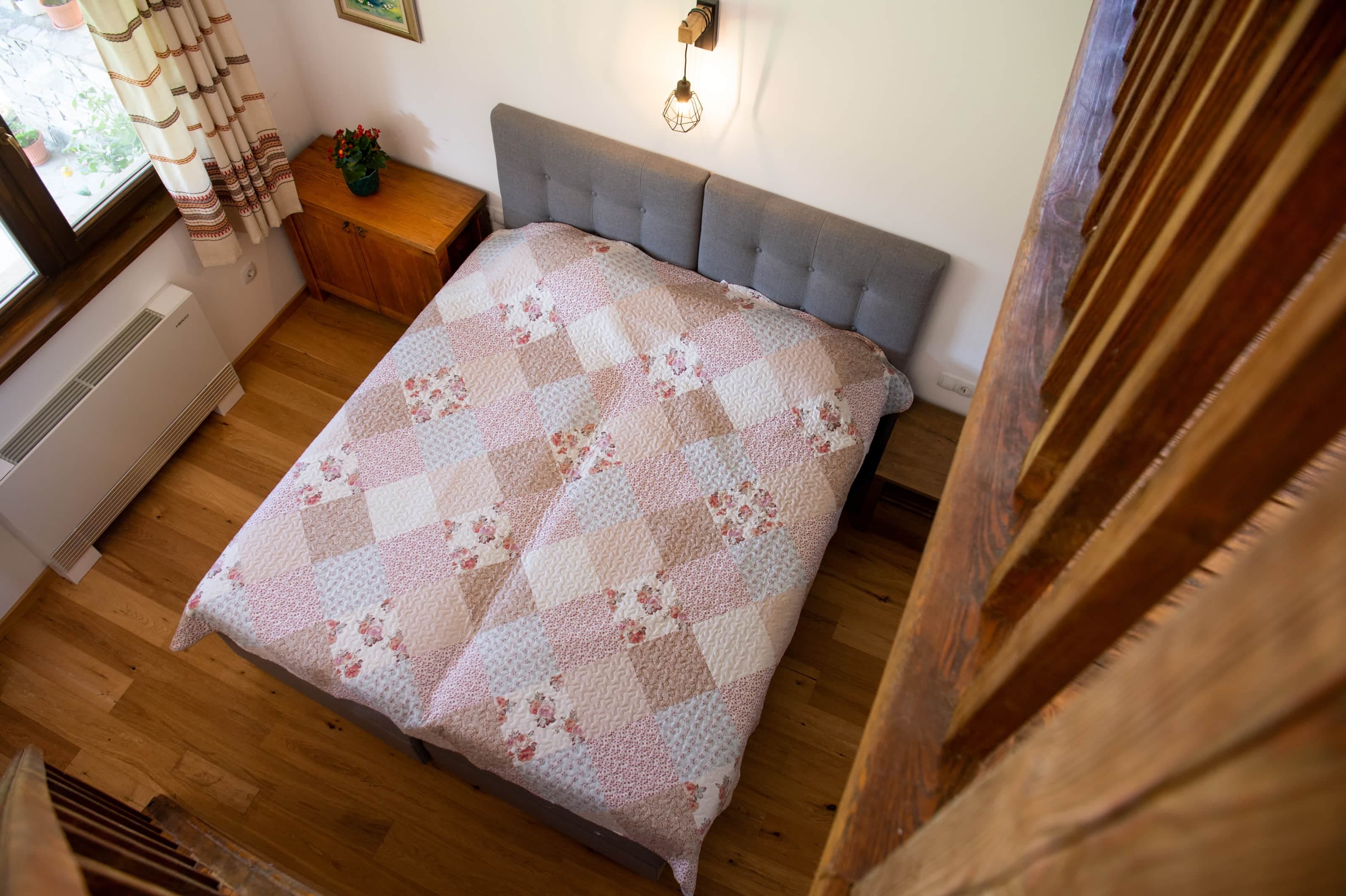 A bedroom with two twin beds or a double