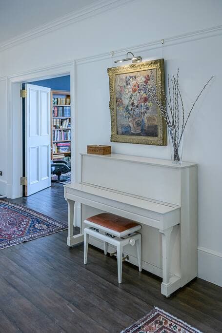 The piano in the main hall is available for guests to entertain each other
