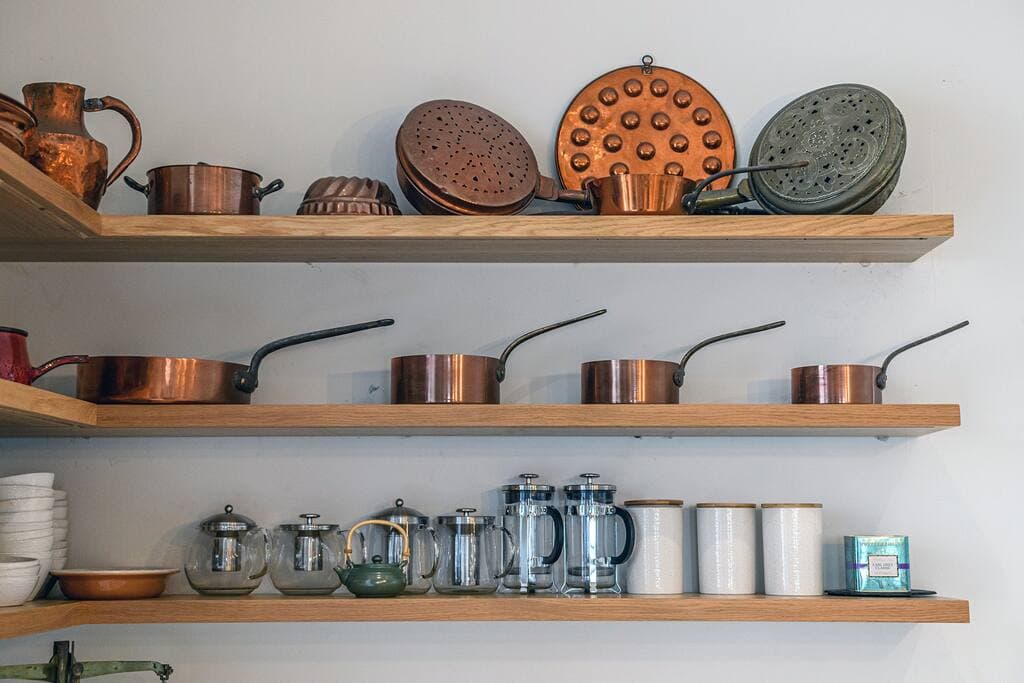 French copper pots in the kitchen (plus more modern tea and coffee pots)