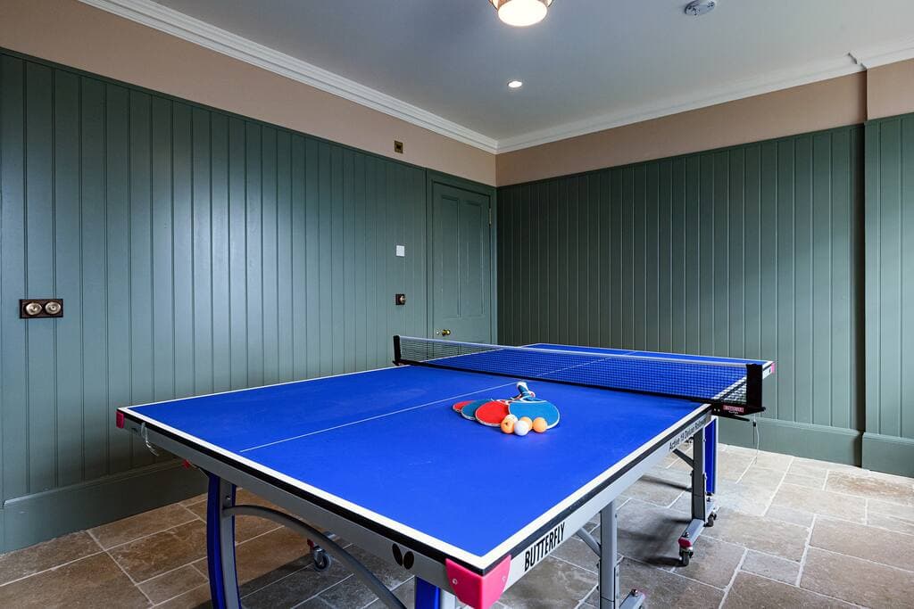 The boot room also doubles as a table tennis room