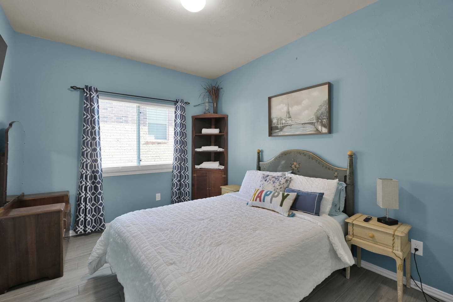 Victorian style queen bed room is one of two guest rooms. Smart TV and lots of linen makes this room a hit for all our guests