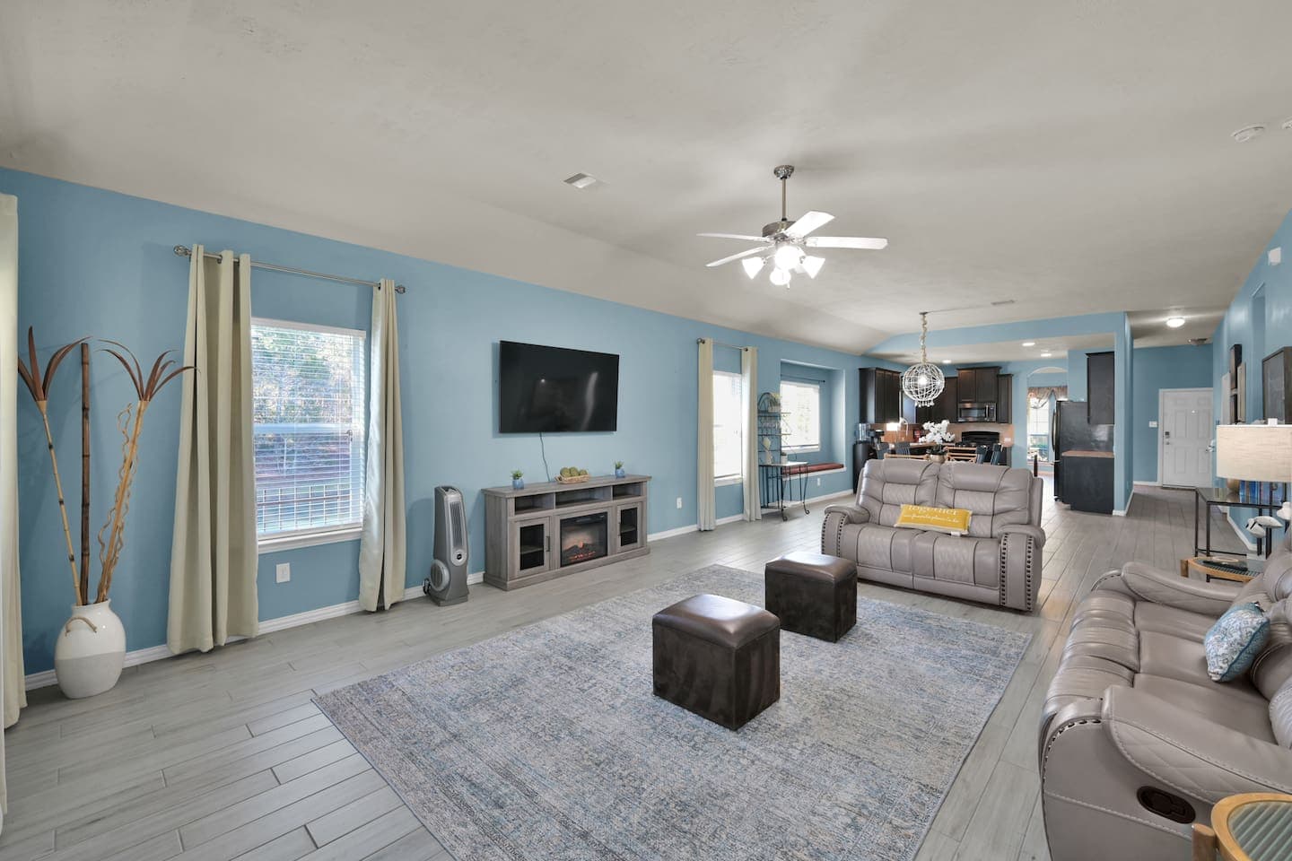 Spacious living room with subtle fireplace for the chilly winters 