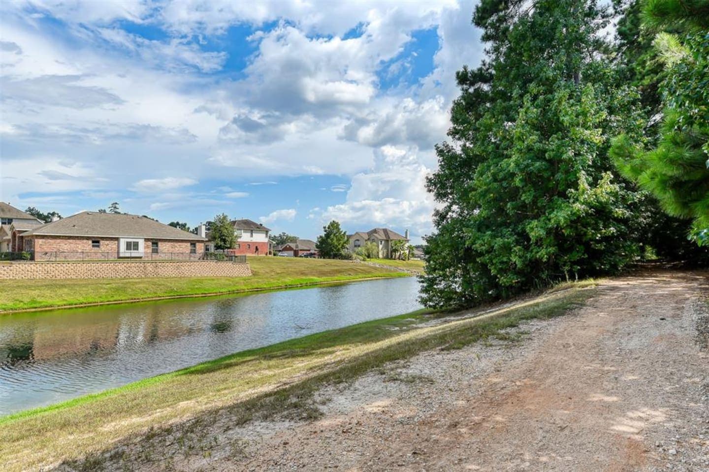 Walking trail next to the home takes you around the most beautiful and serene lake