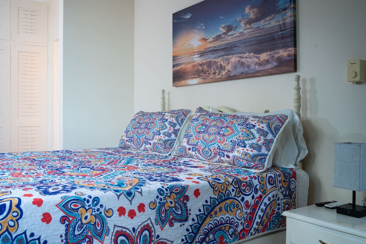 Comfortable bed, crisp linens and supply of towels. Smart bedside lamps with plugs. A/c and fan. 