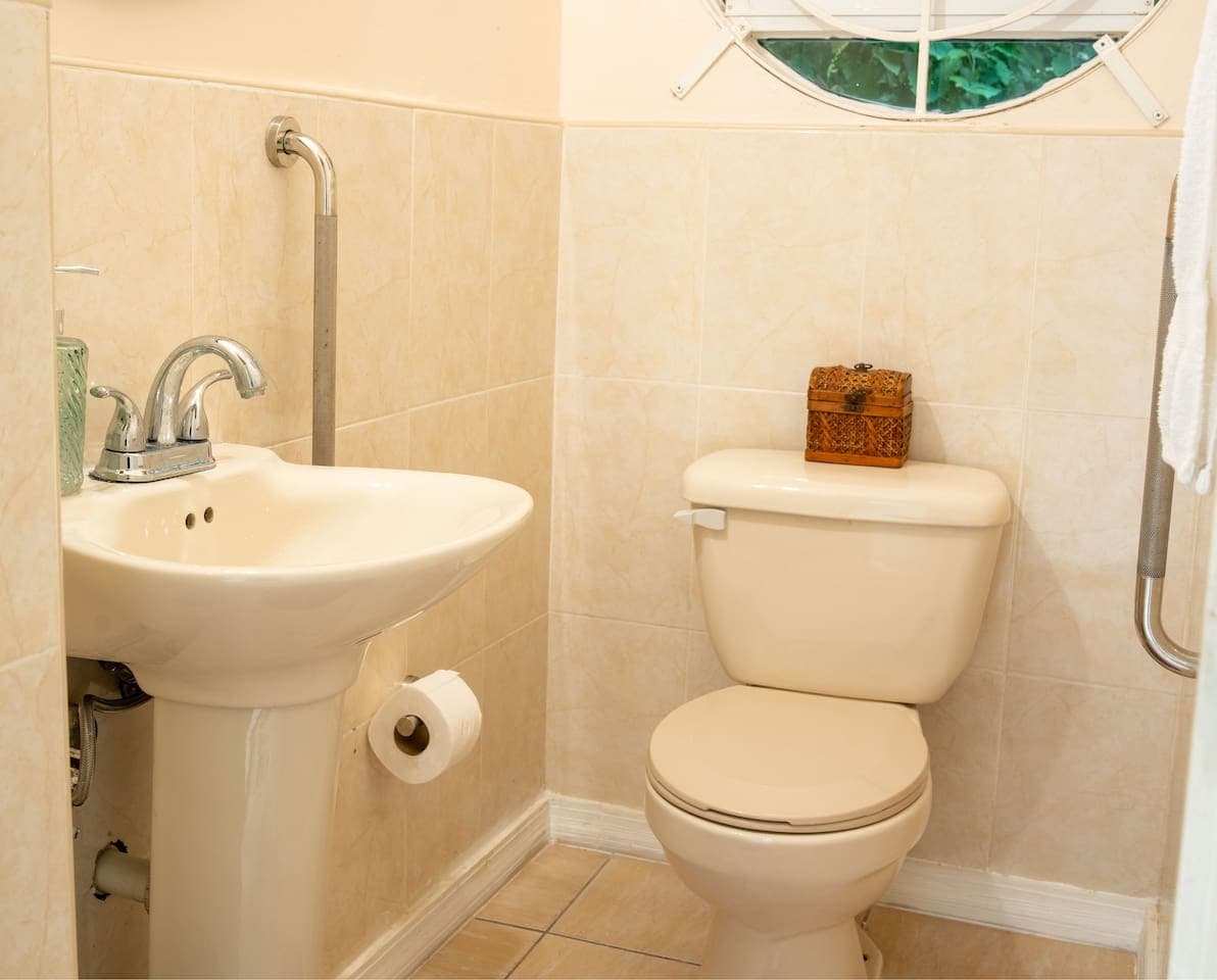 First floor powder room with accessible grab bars