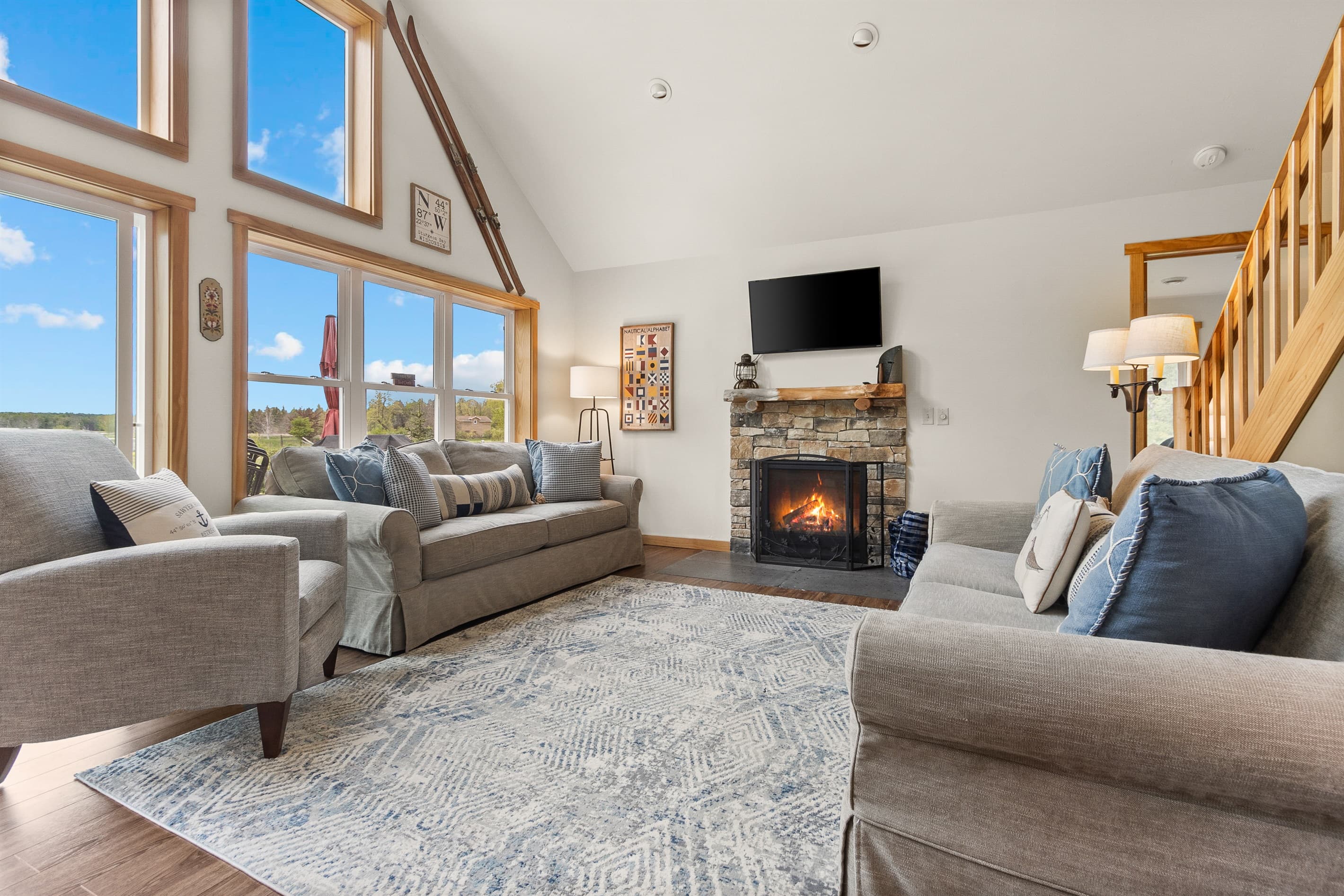 Big windows, harbor light, and a gas fireplace for the evenings when Door County decides to remind you it's still Wisconsin. Great for movie nights, puzzles, or just doing nothing.