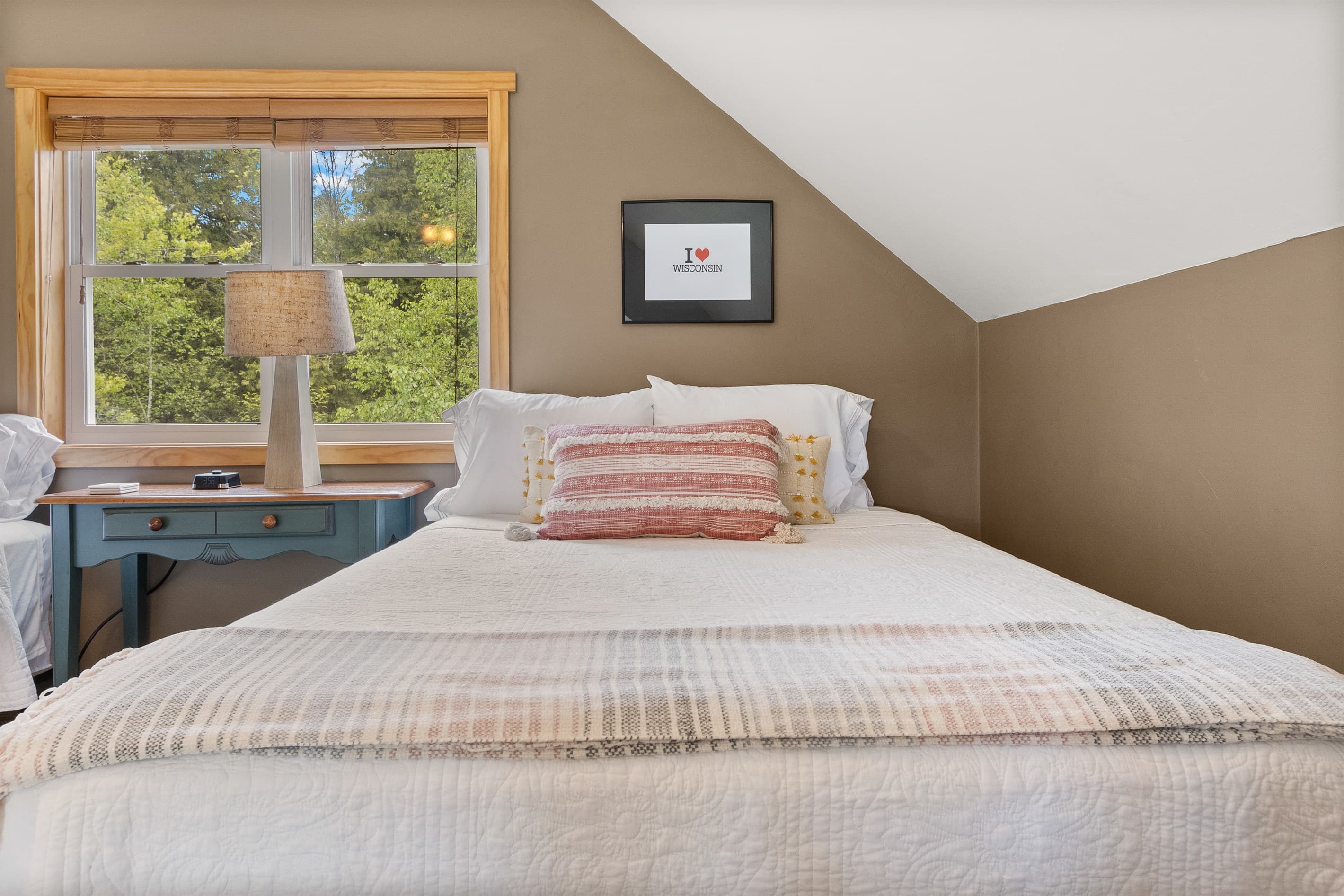 The loft is where groups spread out — two queens, a queen futon, and enough floor for sleeping bags if someone really commits to staying. The kids usually claim it first.