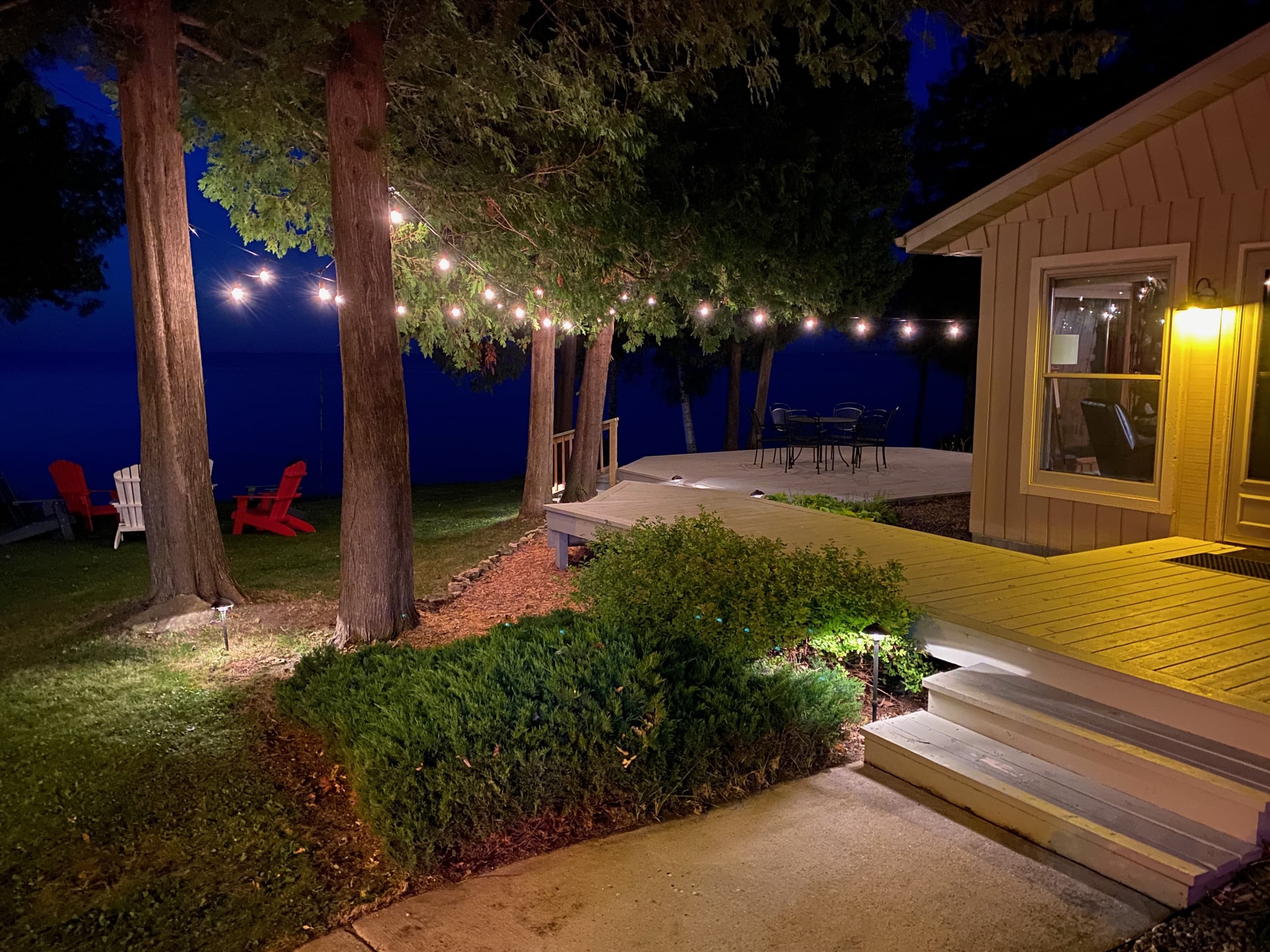 Pull a chair up close, let the fire do its thing, and watch the last light disappear across the bay. This spot earns more five-star mentions than any room in the cottage.