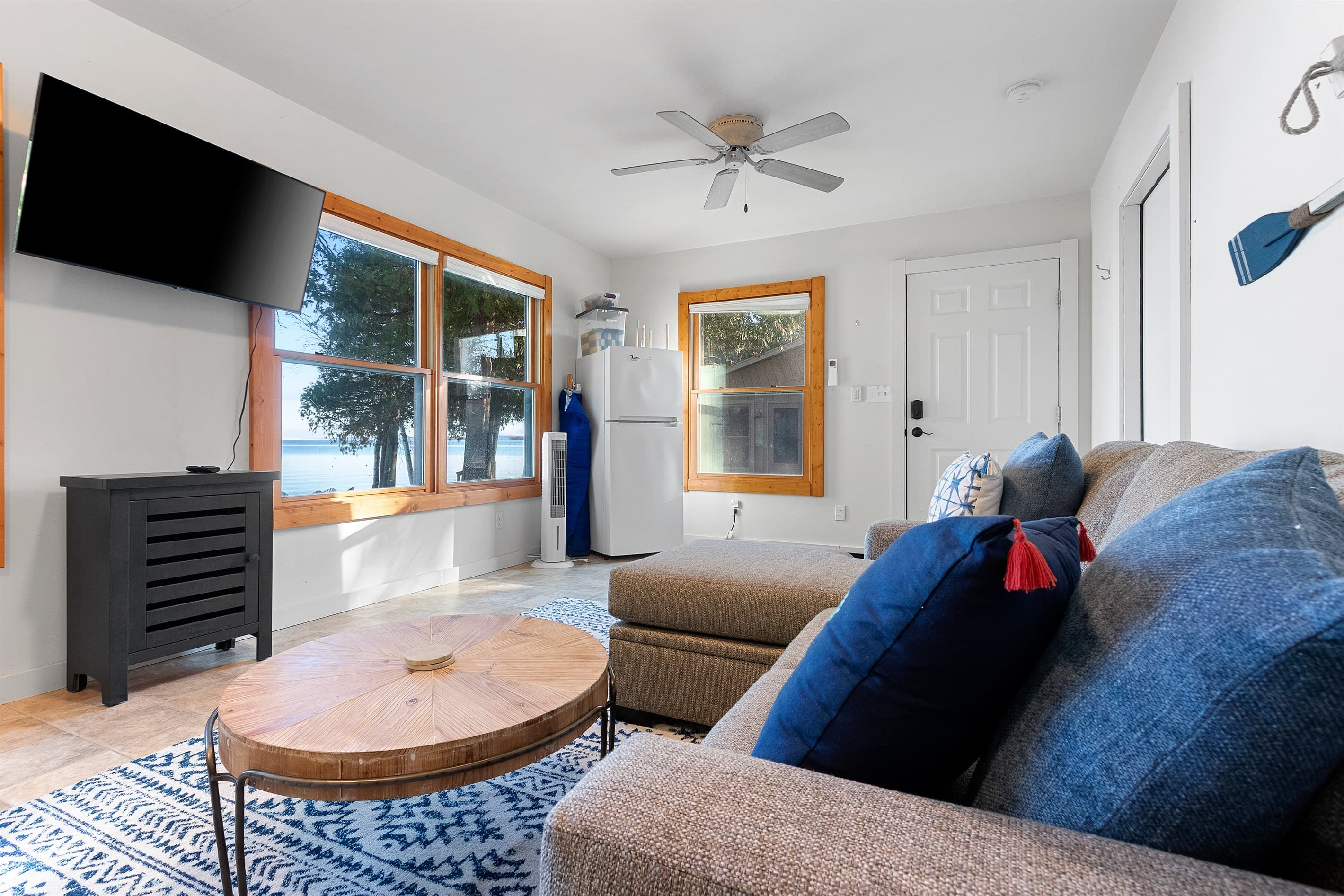 The kids claimed this space the moment they saw it. Bunk beds, their own sofa, and oars on the wall as a reminder of what's waiting outside. Adults get their quiet. Everyone wins.