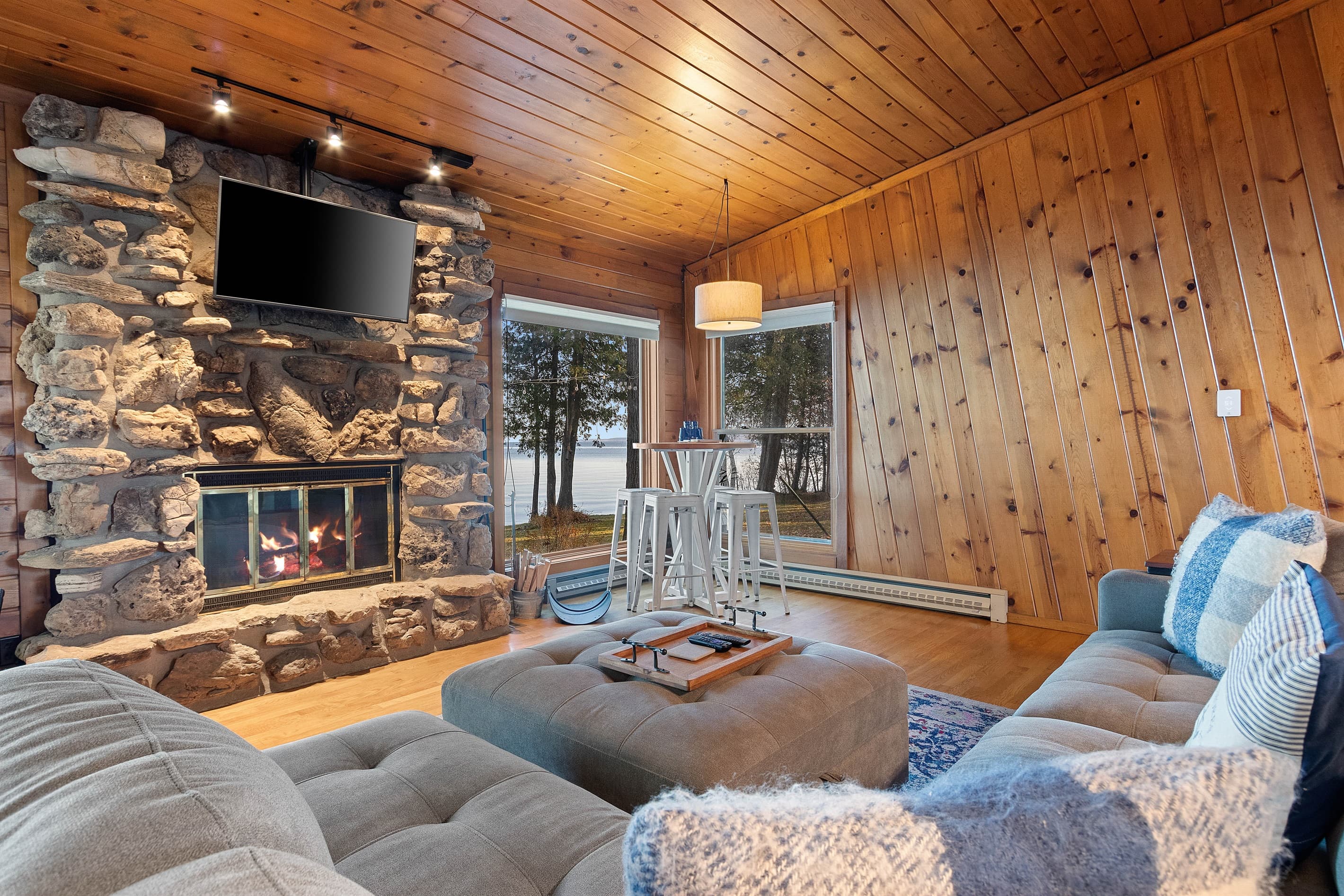 The living room is the perfect spot to catch up on reading or playing games with friends. A large couch, an easy chair and fireplace make this space cozy while you're here!