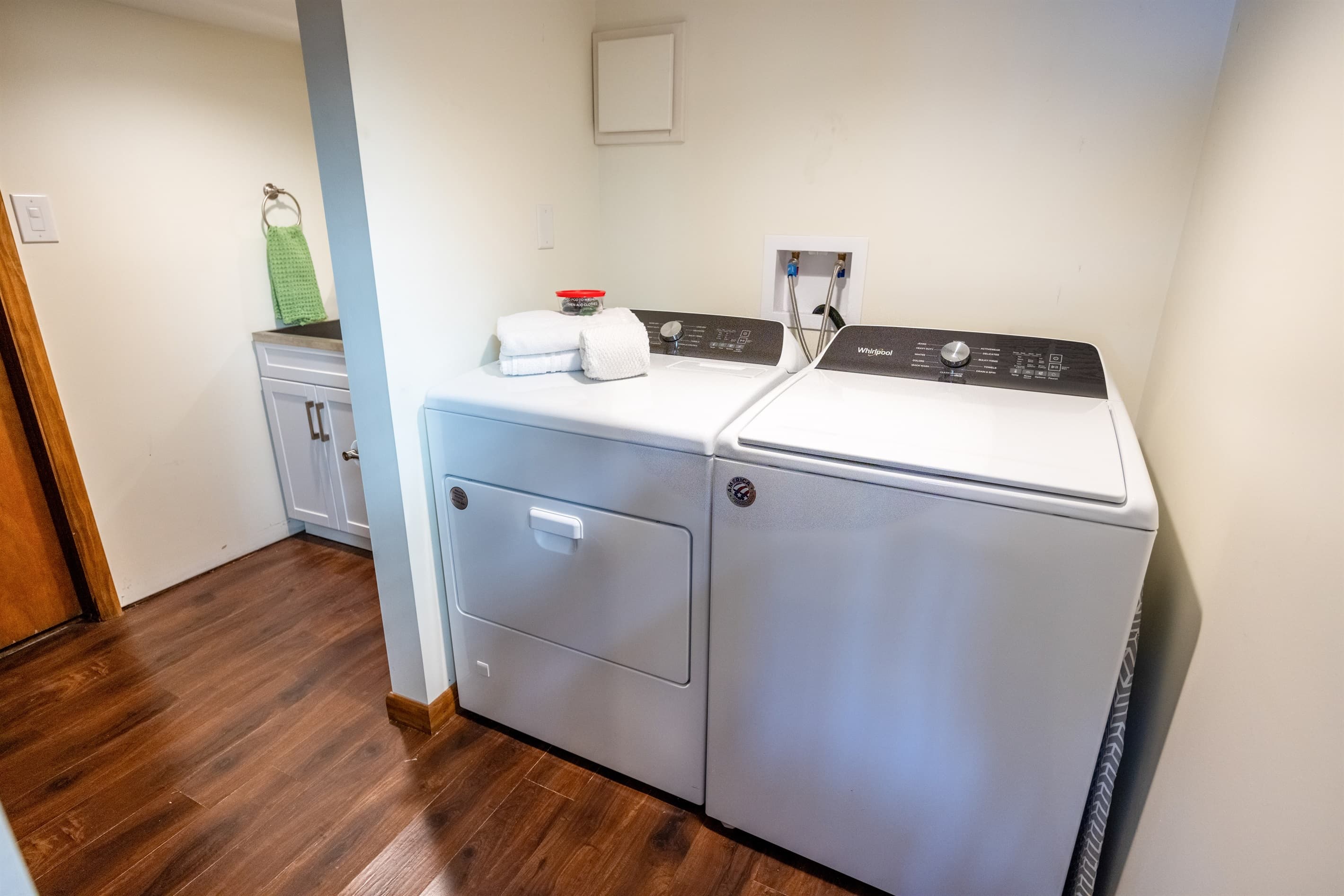 Laundry with detergent provided | Walk through to half bath