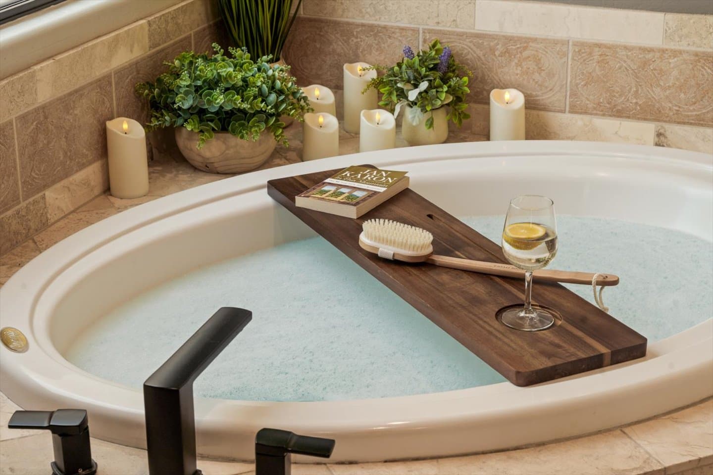 Soak away your stress in the huge soaker tub, located in the primary suite. Grab your favorite book, turn on the candles and just....breathe.