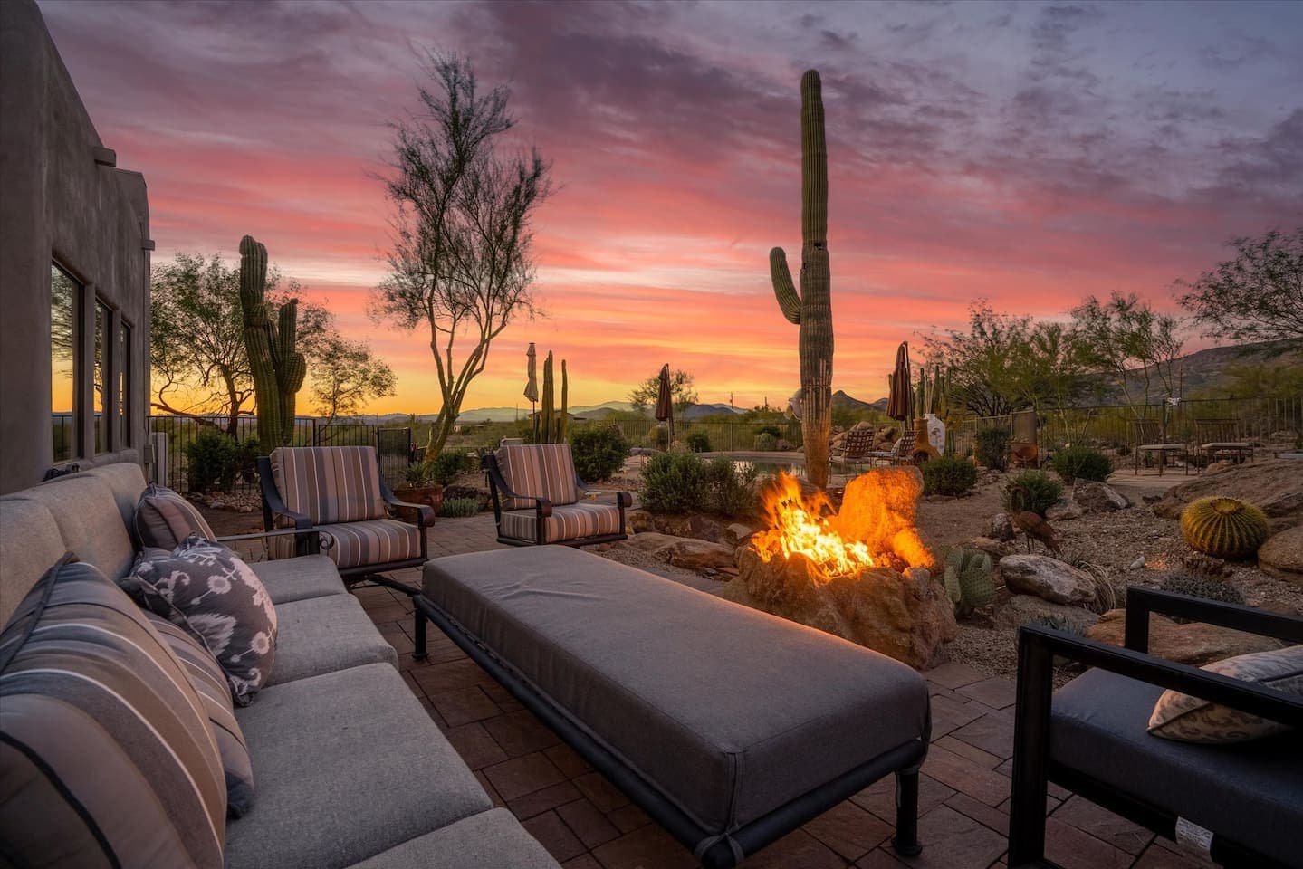 Kick back in the spacious, comfortable outdoor seating area w/gas fire feature—perfect for evening stargazing, beautiful mountain views as the backdrop and easy access to all the patio games.