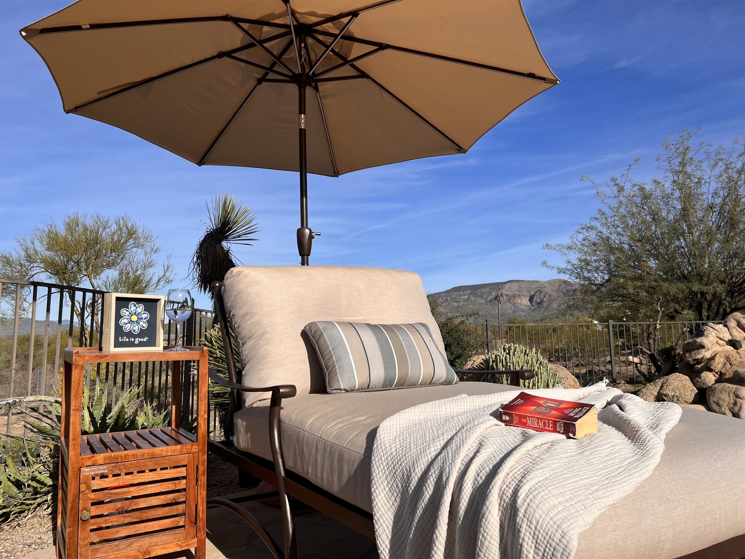 Cuddle up with your favorite person in our double wide chaise lounger, or just take all that extra space for yourself! With a view of the pool and the mountains this might be your favorite spot!