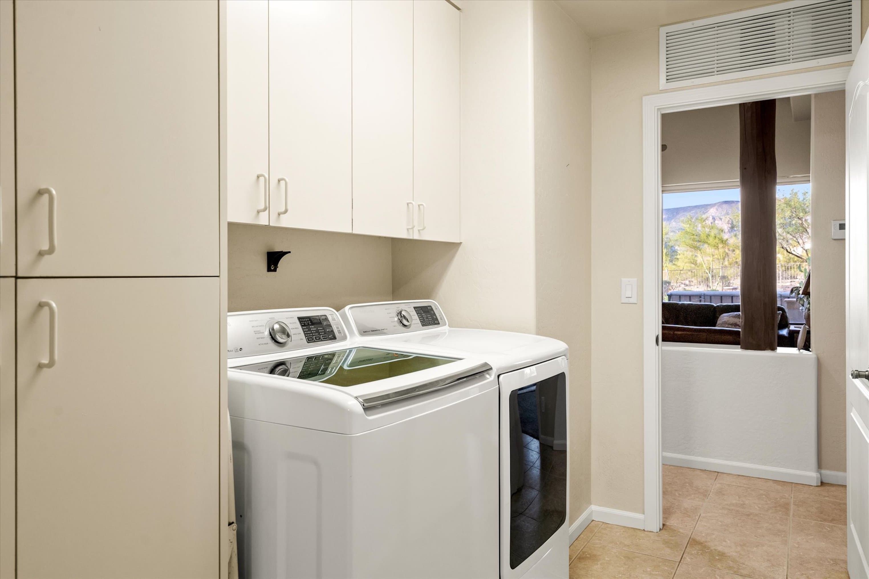 Full size washer and dryer provided with eco friendly detergent sheets for all your laundry needs!