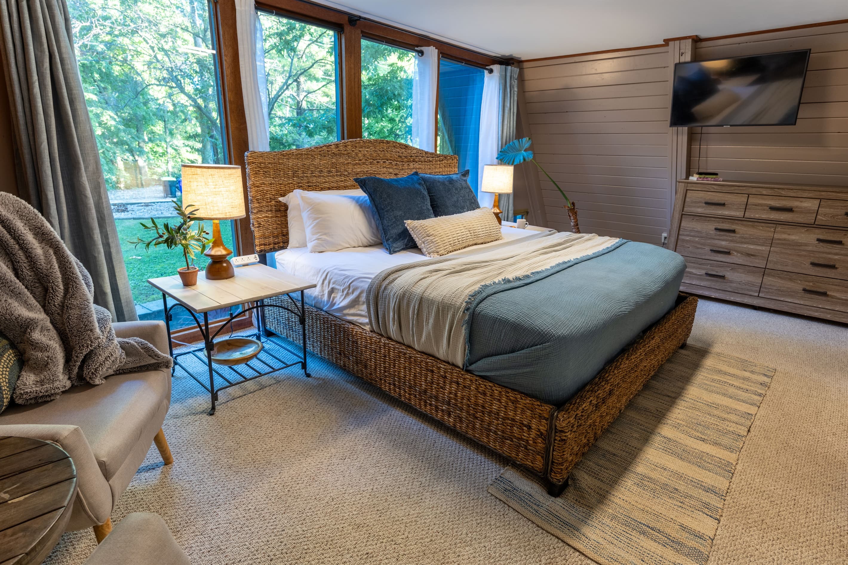 Cozy up in the primary bedroom with a calm design, comfortable mattress, all cotton linens and plenty of drawers and hanging storage.