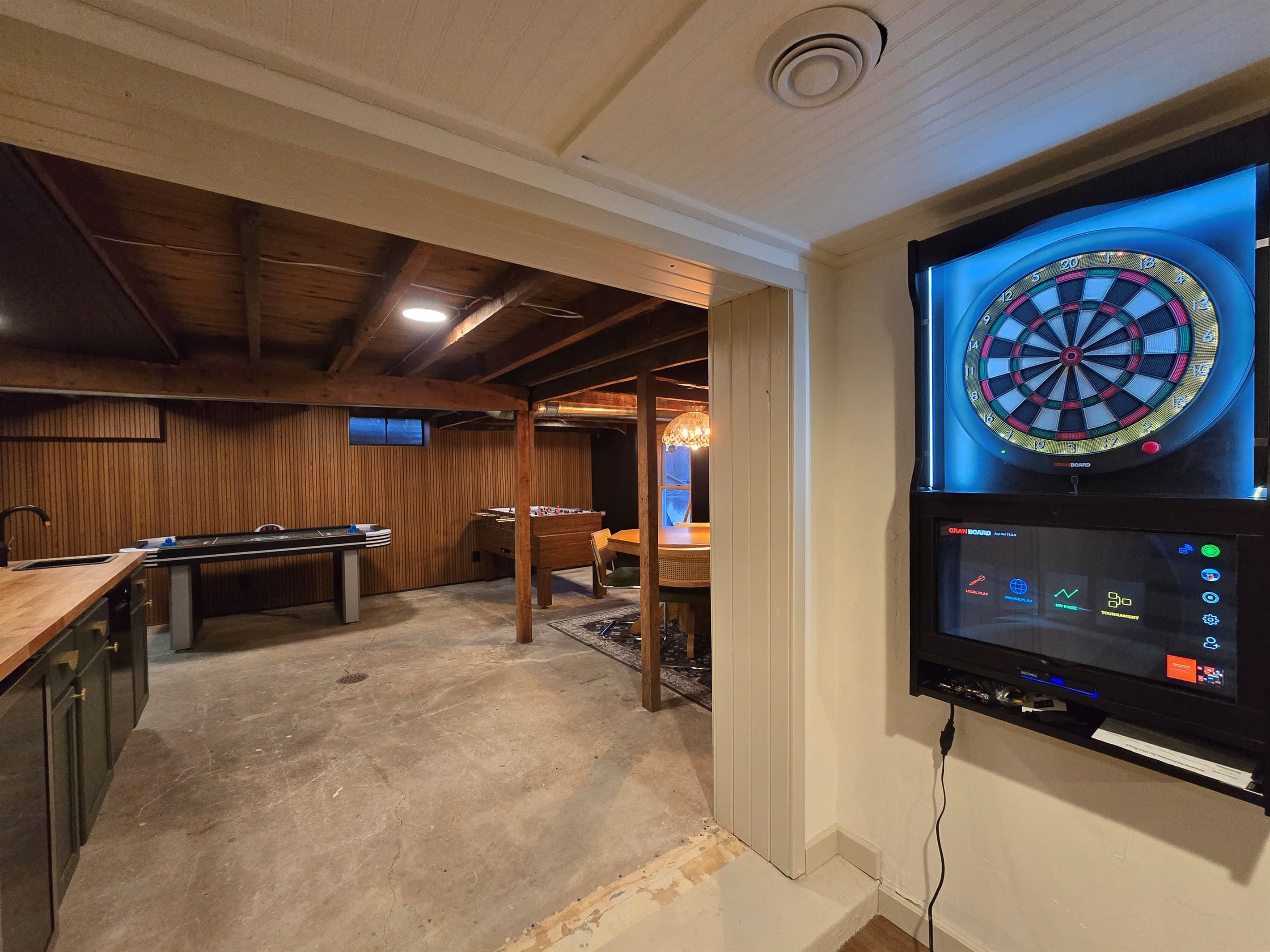 - Enjoy multiple games in this fun lower level space   - Dartboard and foosball add excitement for all ages   - A playful hangout designed for memorable moments