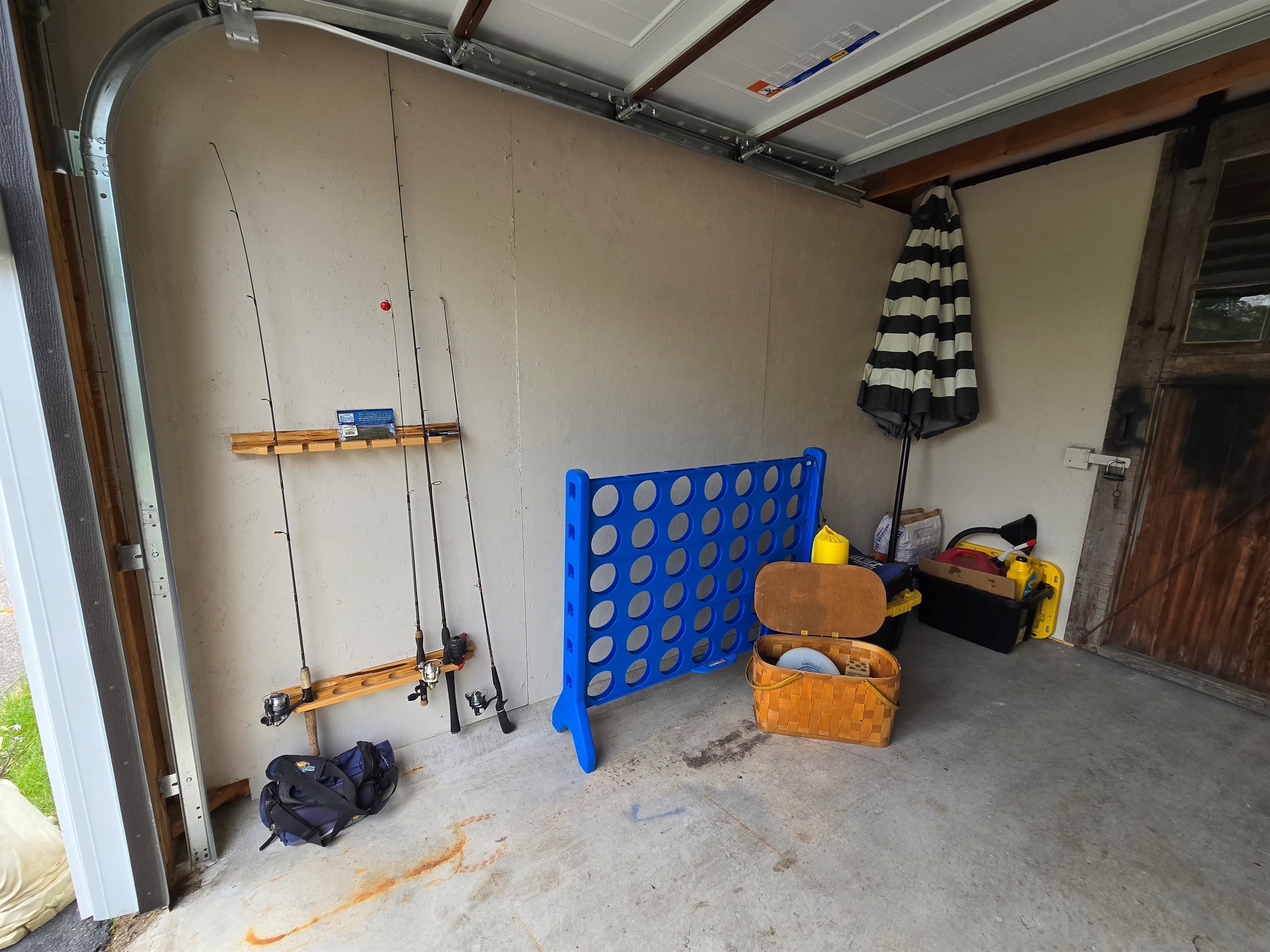 - Fishing gear storage with family yard games   - Grab a rod or connect four for outdoor fun   - Easy access to lakeside adventure essentials