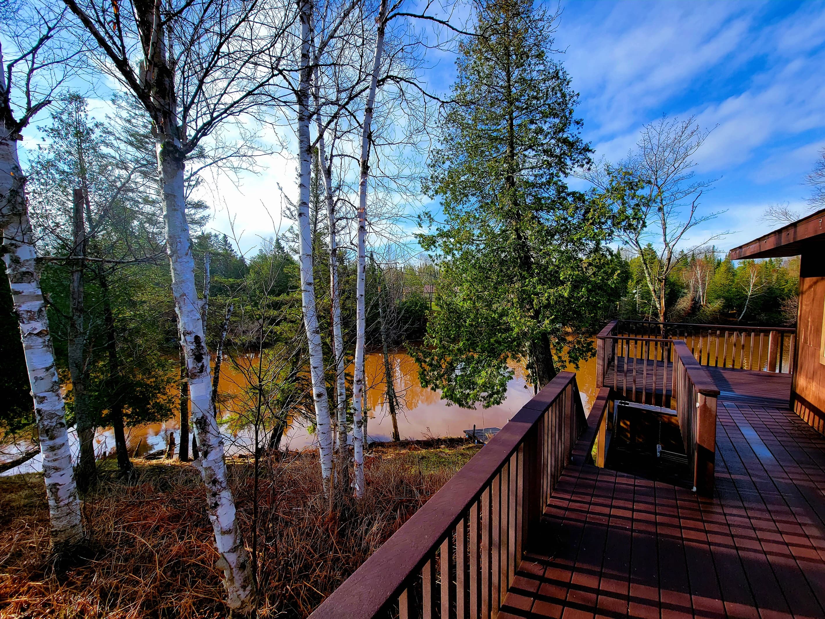 Wake up and sip coffee in the morning right outside your Walk-out master bedroom with a beautiful river view