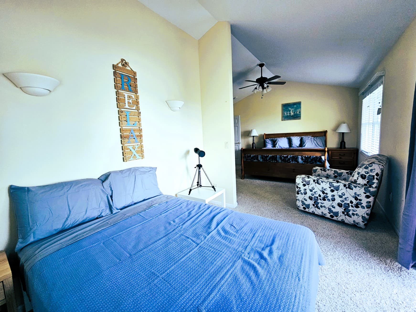Master bedroom full sized bed with lake view