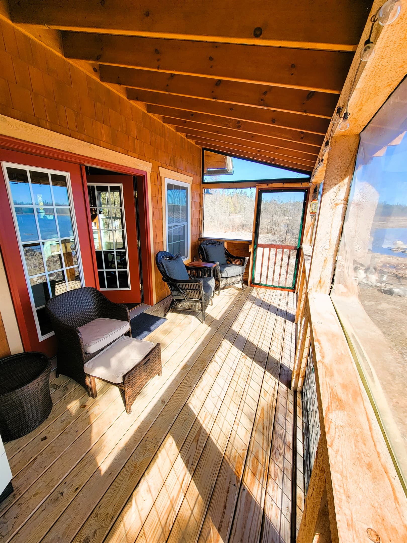 3 seasons room is nice and cozy on a chilly morning with great lake views