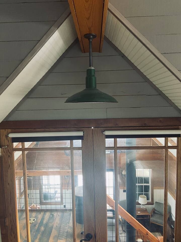 Master french doors with pull down shades for privacy