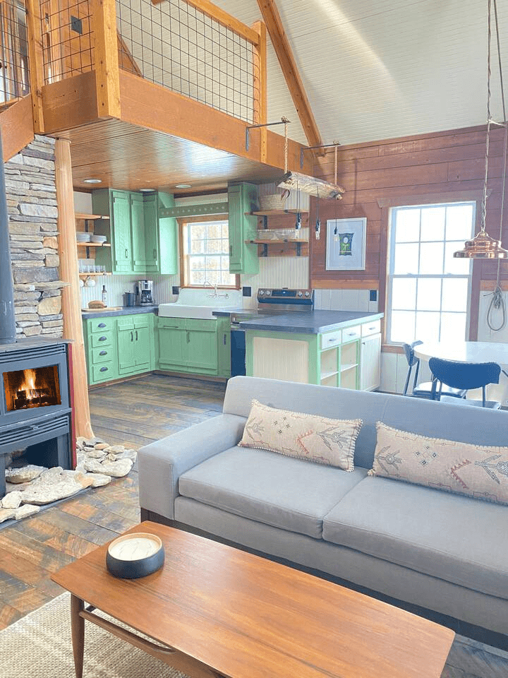 Cozy sleeper sofa with wood burning fireplace