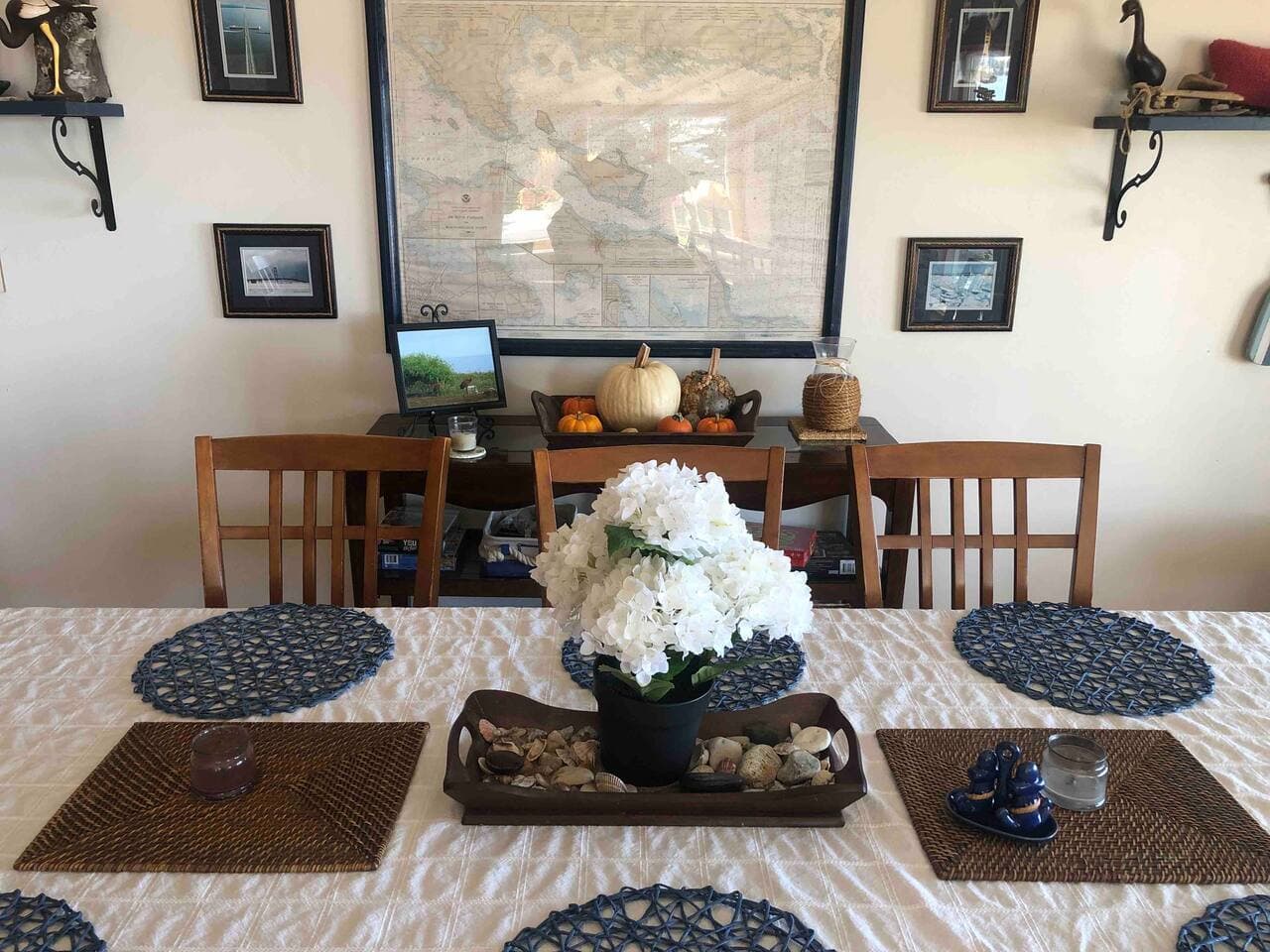 large table with 8 chairs in great room