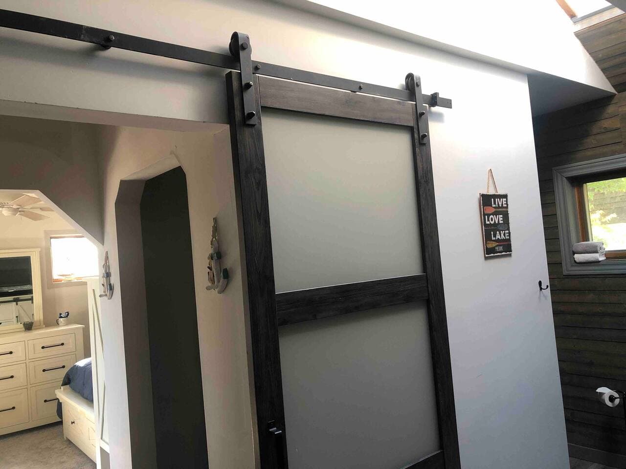 barn door in the master bathroom