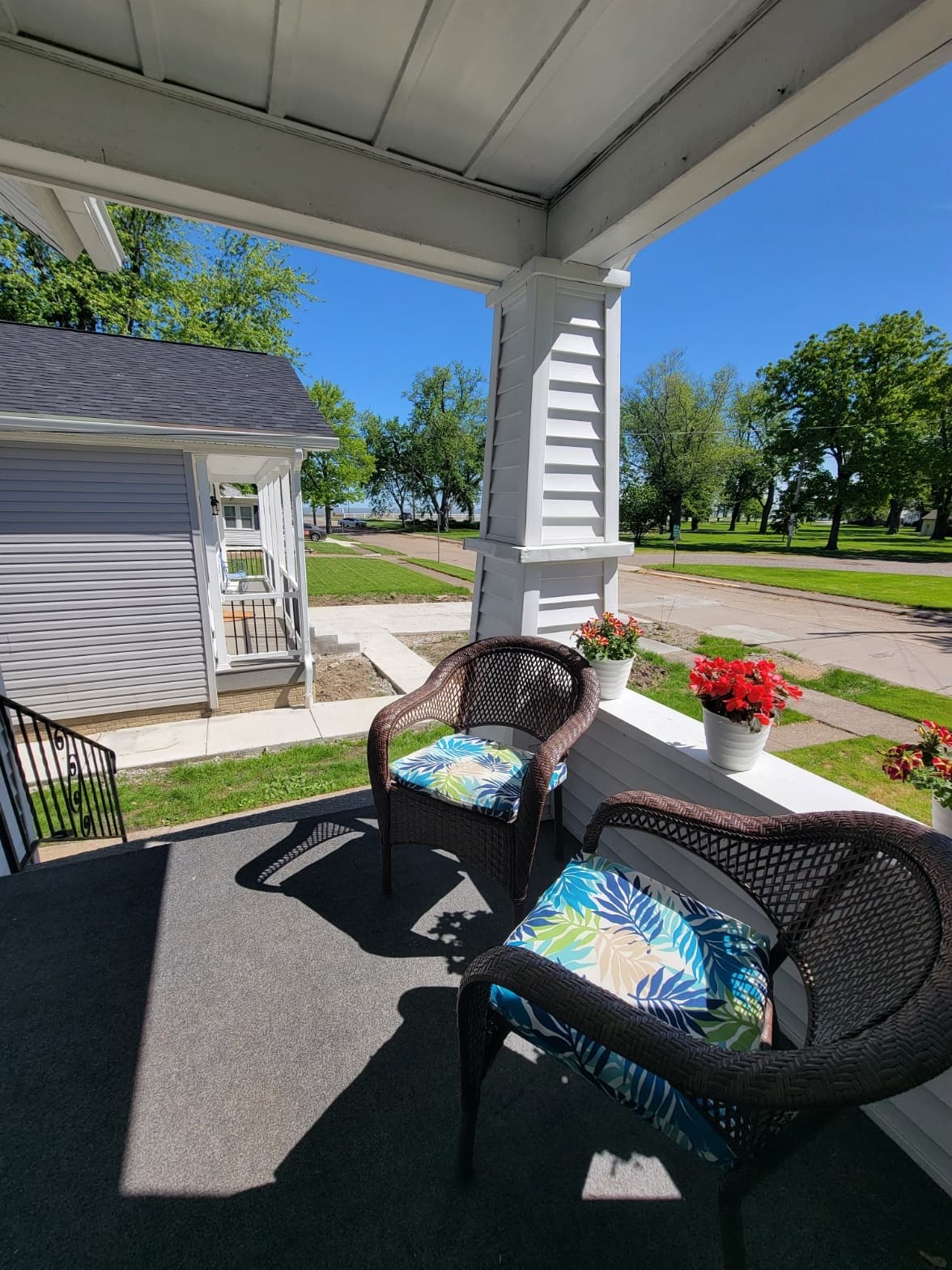 Front porch sitting area with lake view