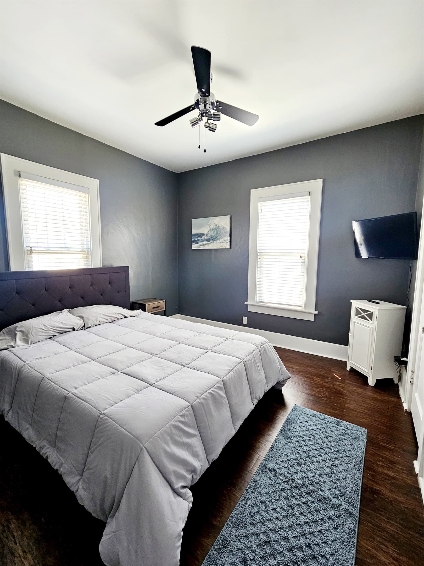 Bedroom 1 has a 32" smart TV and Queen sized bed