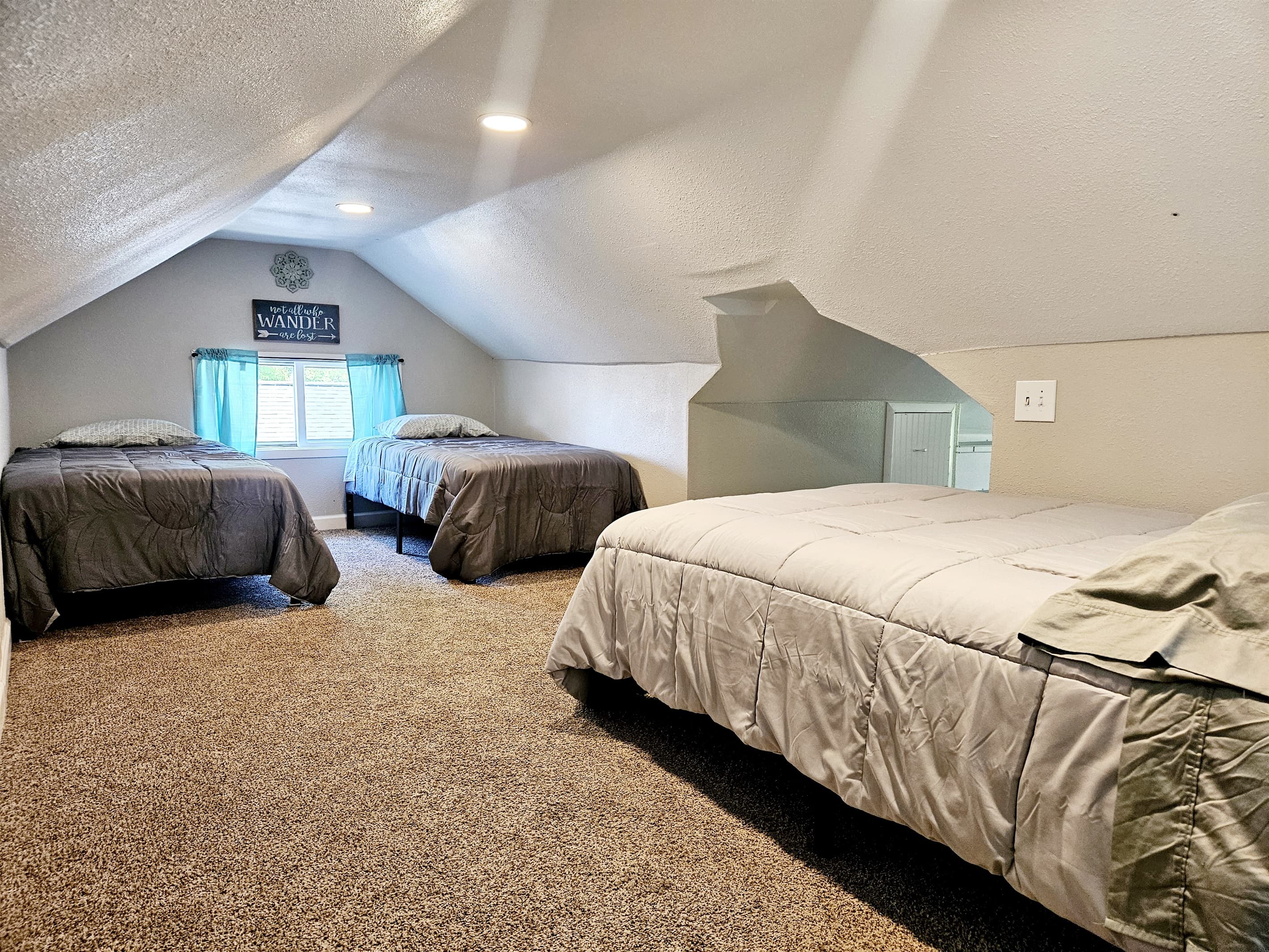 Bedroom 3 - is the upstairs 'cape cod' style room. It has 2-twin sized beds and one Full sized bed.
