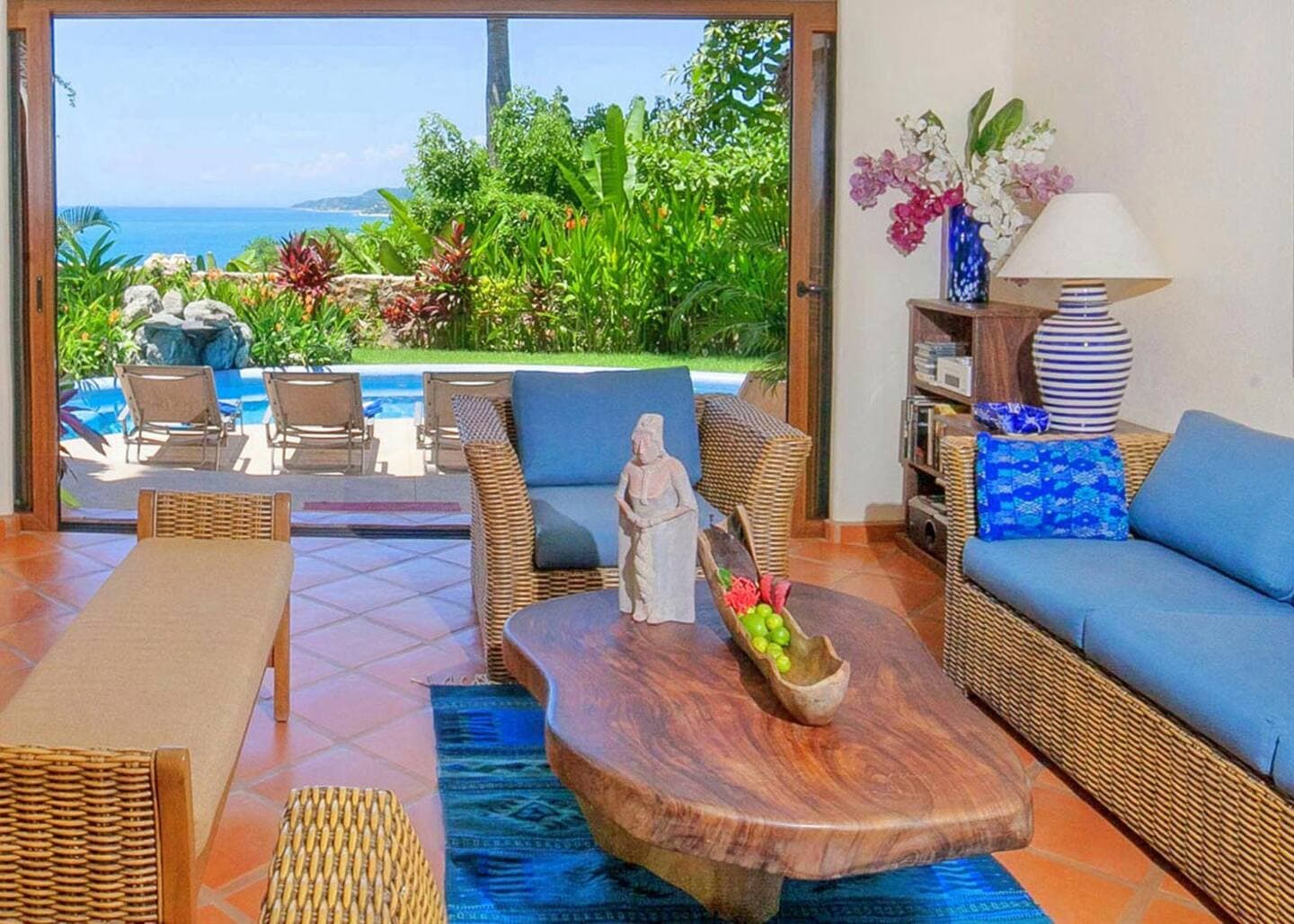 Open air living room on the first floor adjacent to the kitchen/dining room.