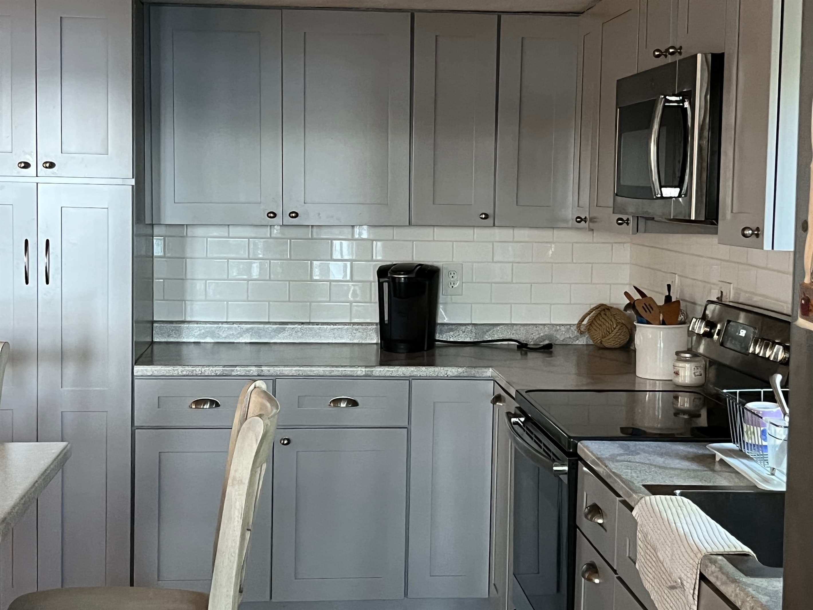 Modern, well-stocked kitchen.