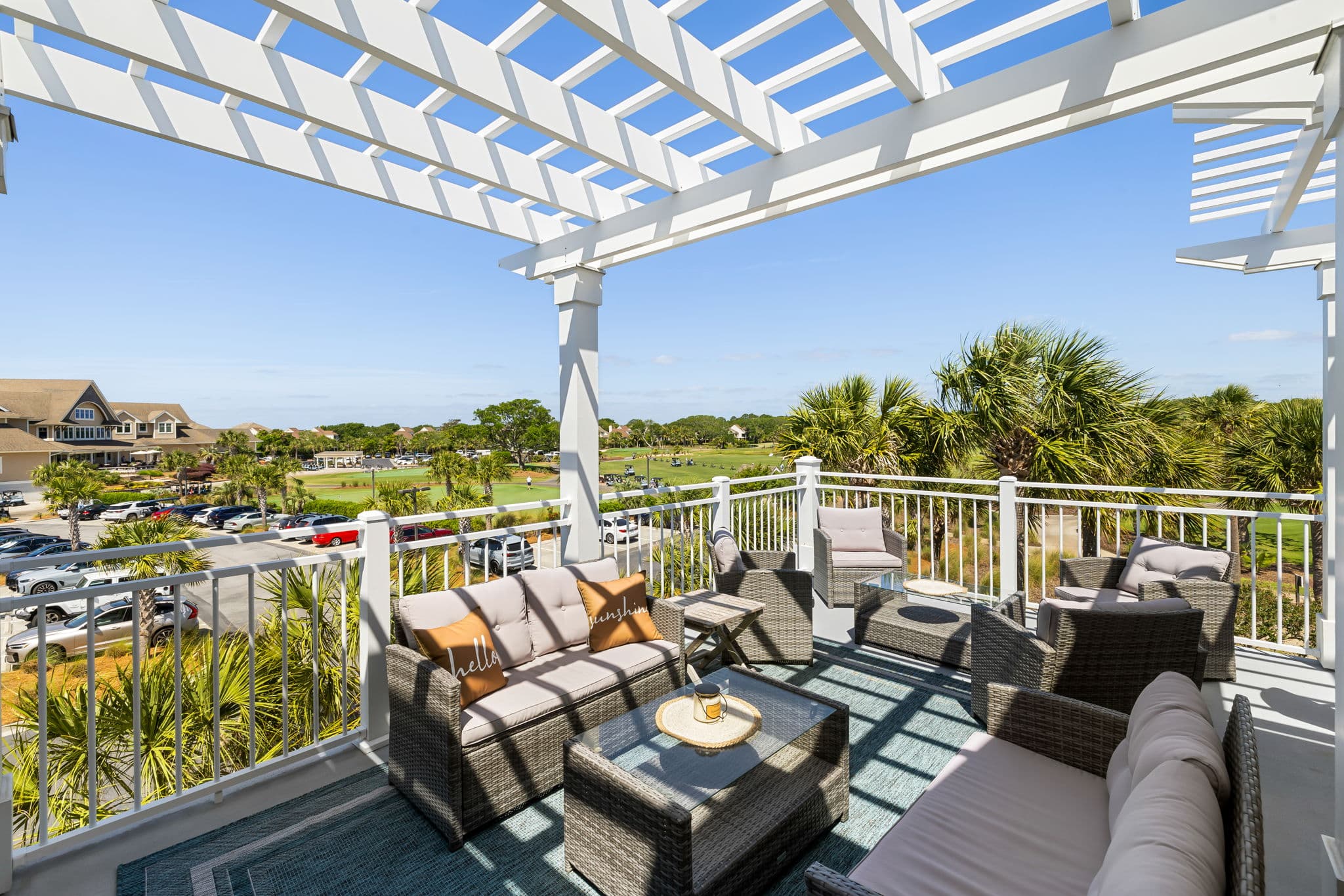 Covered patio w/ golf views made for relaxed afternoons.