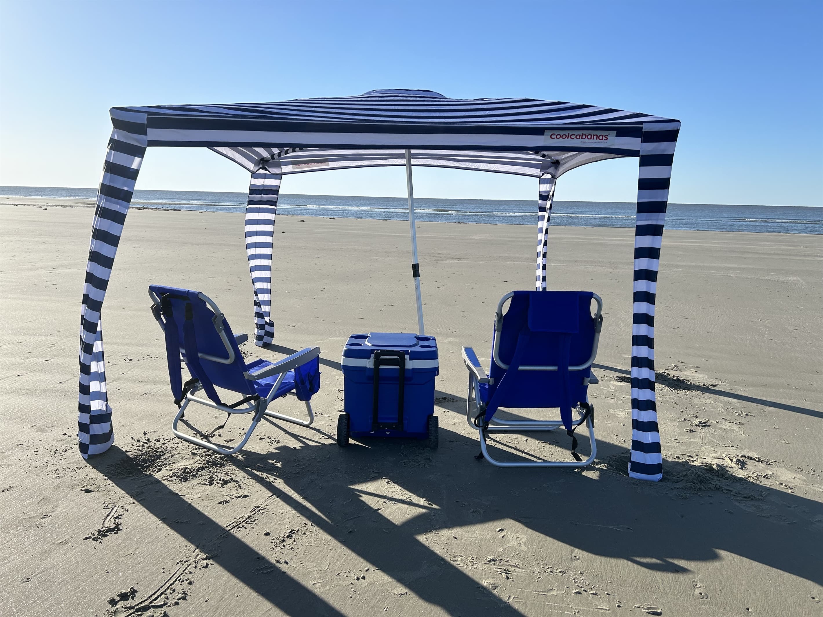 Relax on shaded beach swings w/ ocean breezes.