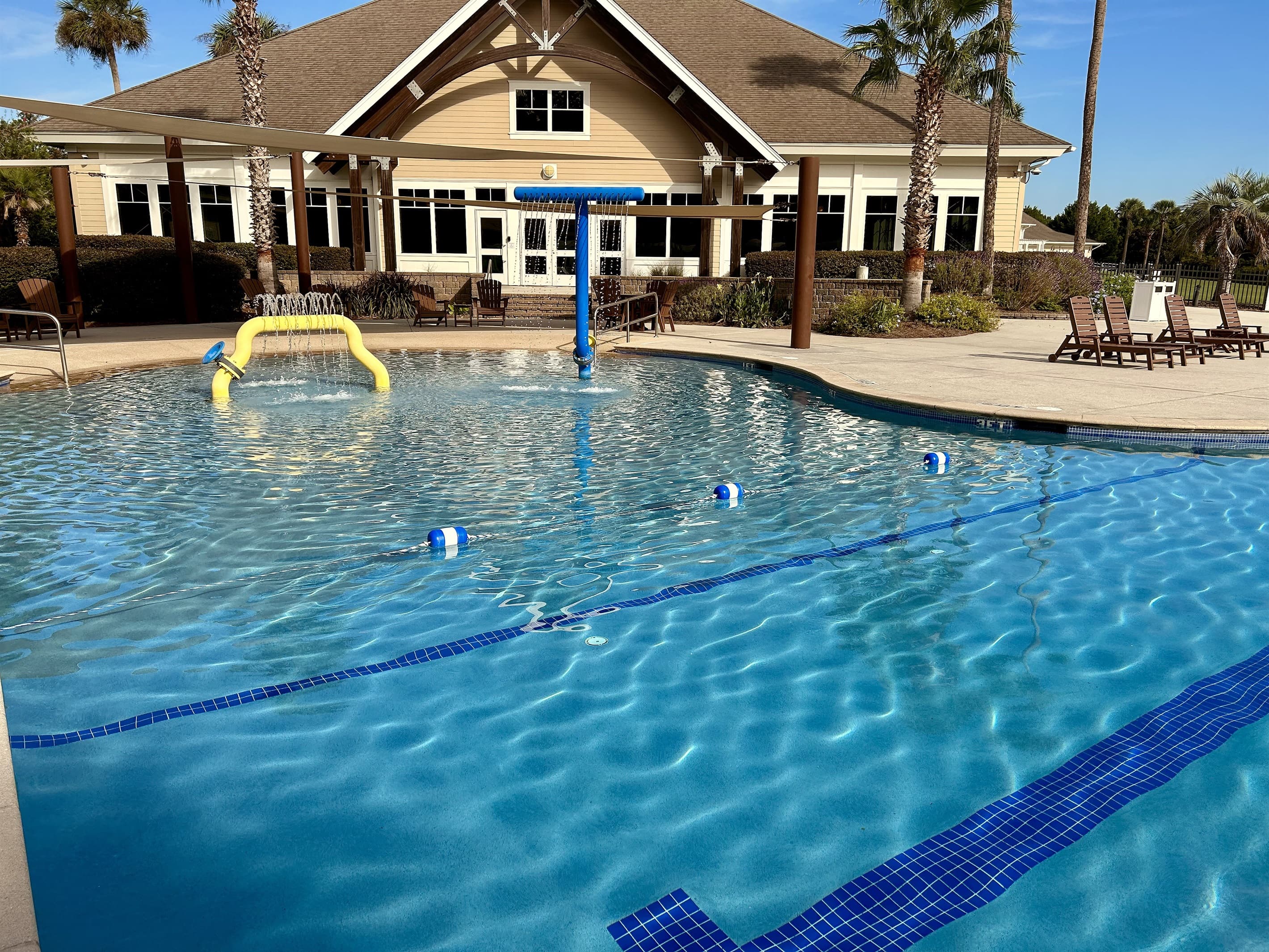Cool off in the inviting outdoor pool under sunny skies.