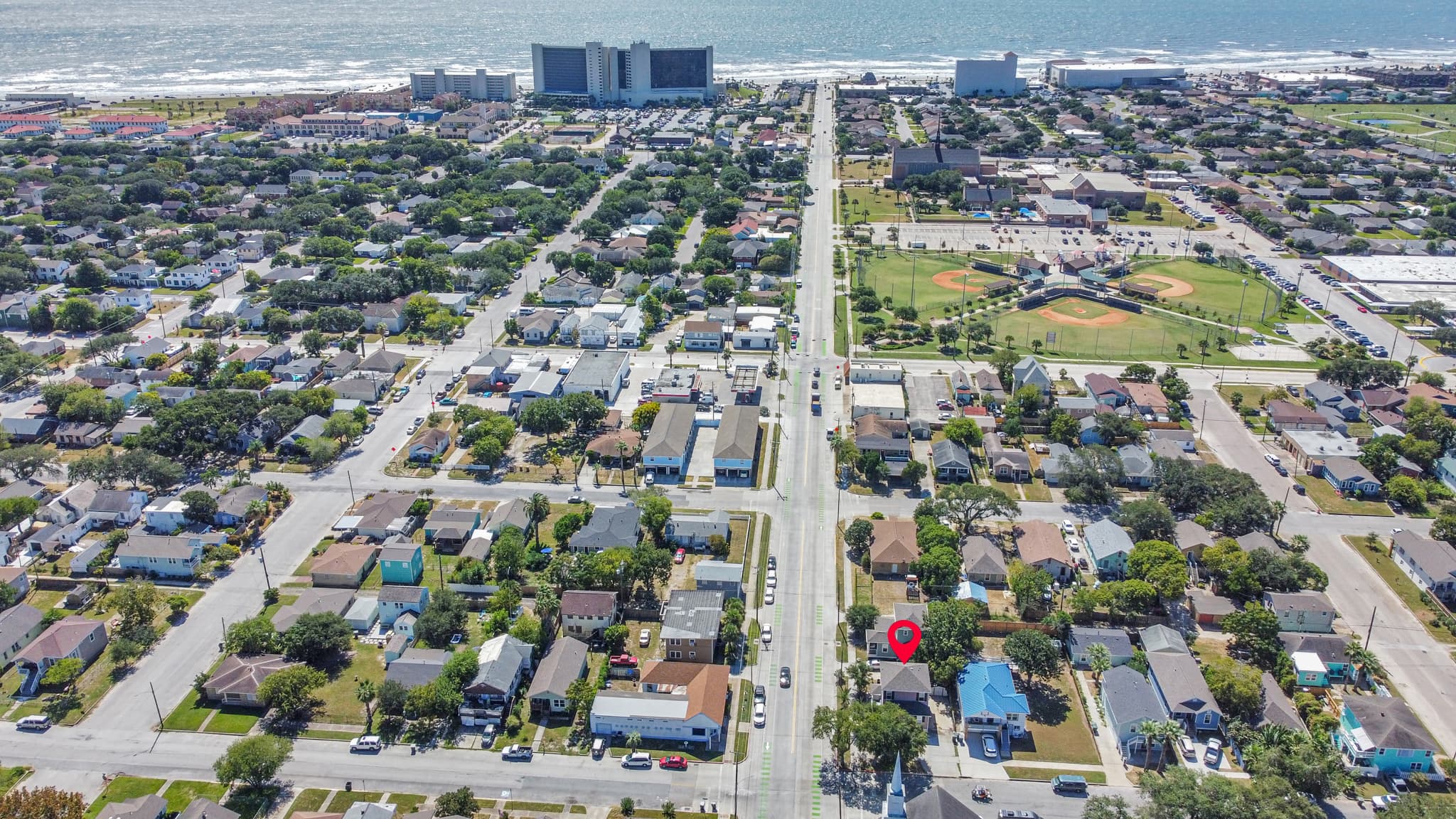 The Galveston Seawall and beach are just blocks from Summer Bliss (pinned) — a rare find for a home that sleeps 9 with private driveway parking.