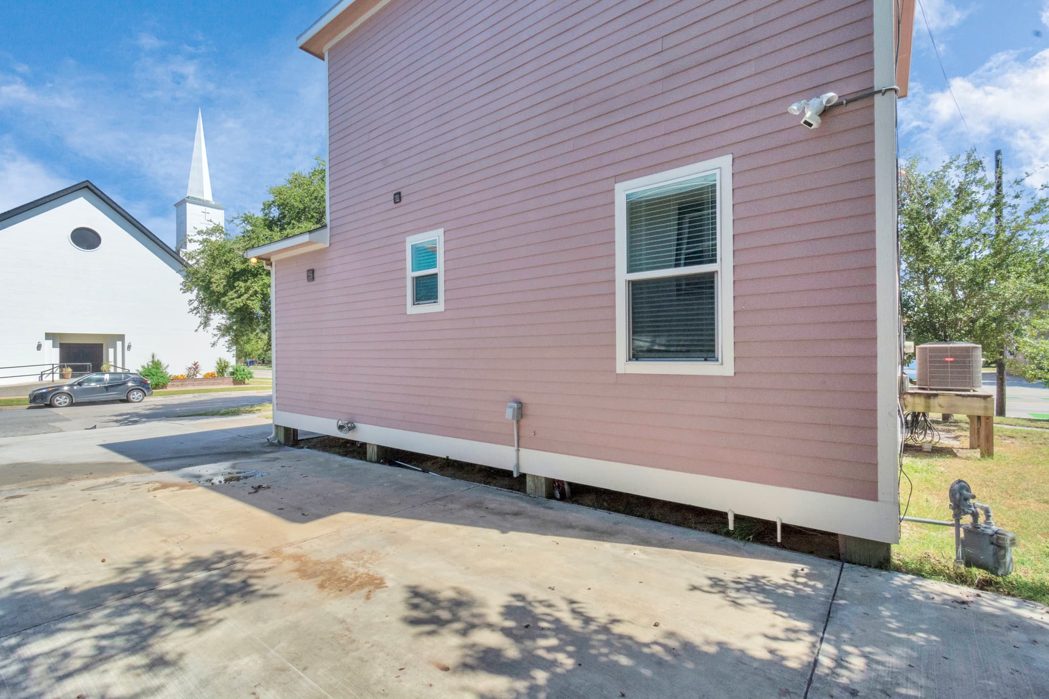 Driveway parking for 2 vehicles at Summer Bliss — private, off-street, and included at no charge. Easy in and out from the corner location.