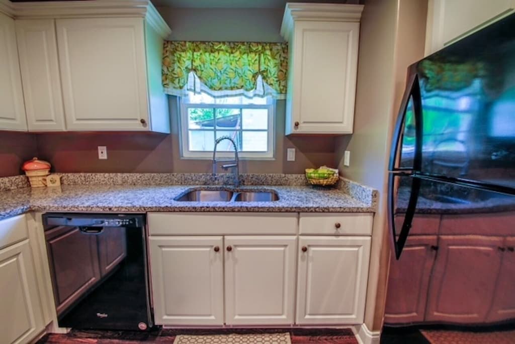 The fully equipped kitchen has everything you need to cook for the group, complete with an island and pantry.