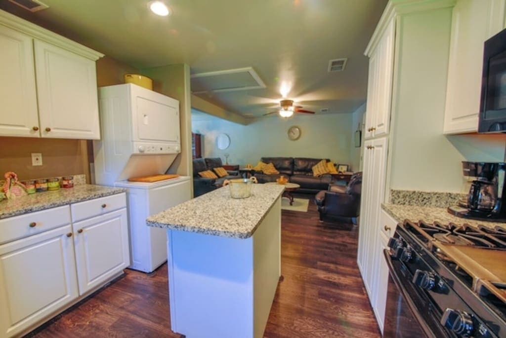 A full pantry and ample cabinets keep everything organized — drip coffee and a Keurig are ready for your mornings.