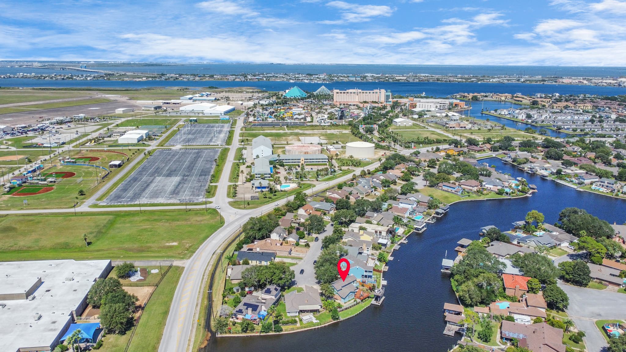 Moody Gardens' iconic pyramids are visible from above — Lakeview Landing is one of the only Galveston rentals where you can walk there.