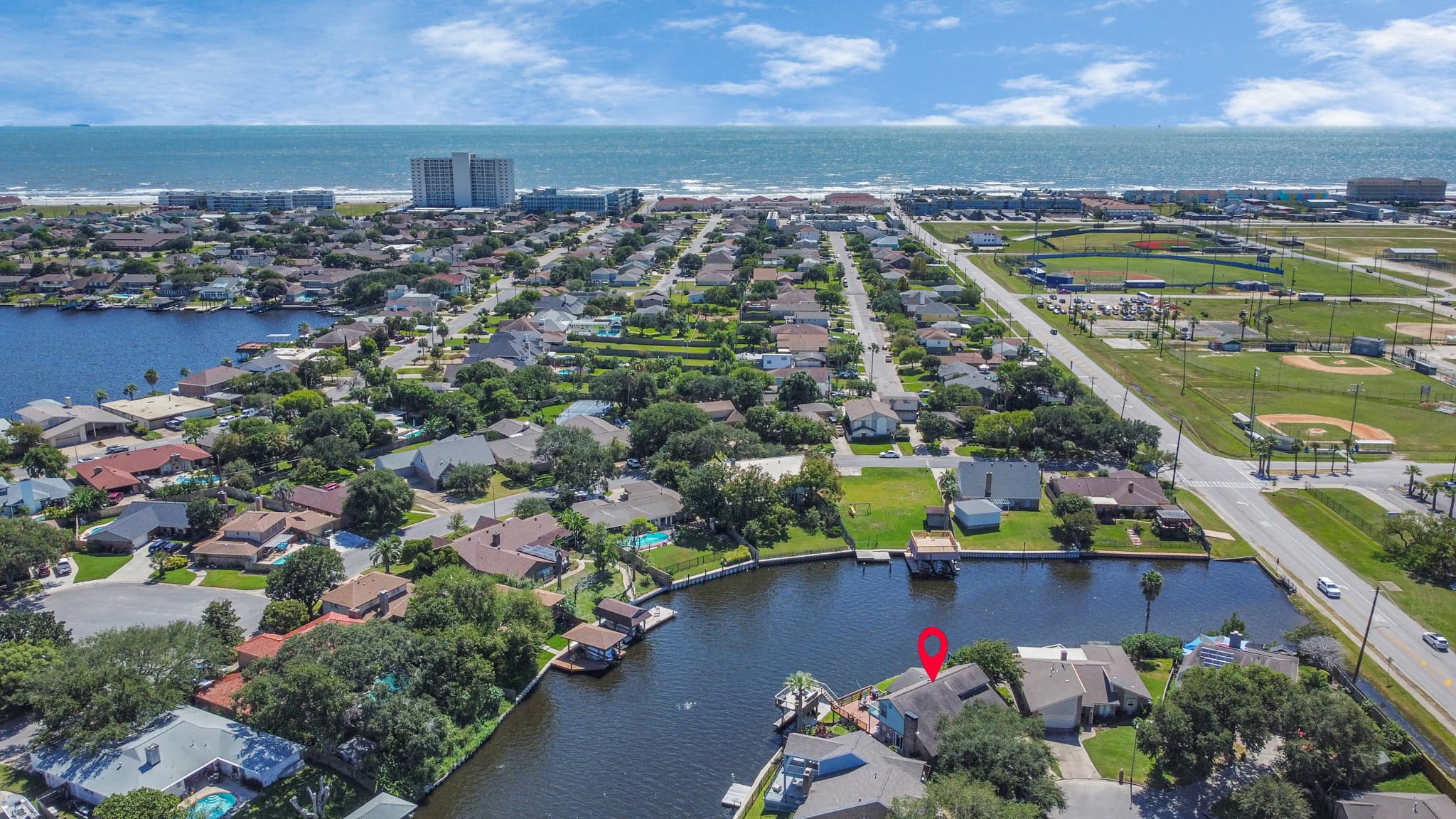 Aerial perspective of the Lakeview Landing neighborhood — peaceful waterfront living in the heart of Galveston Island, TX.